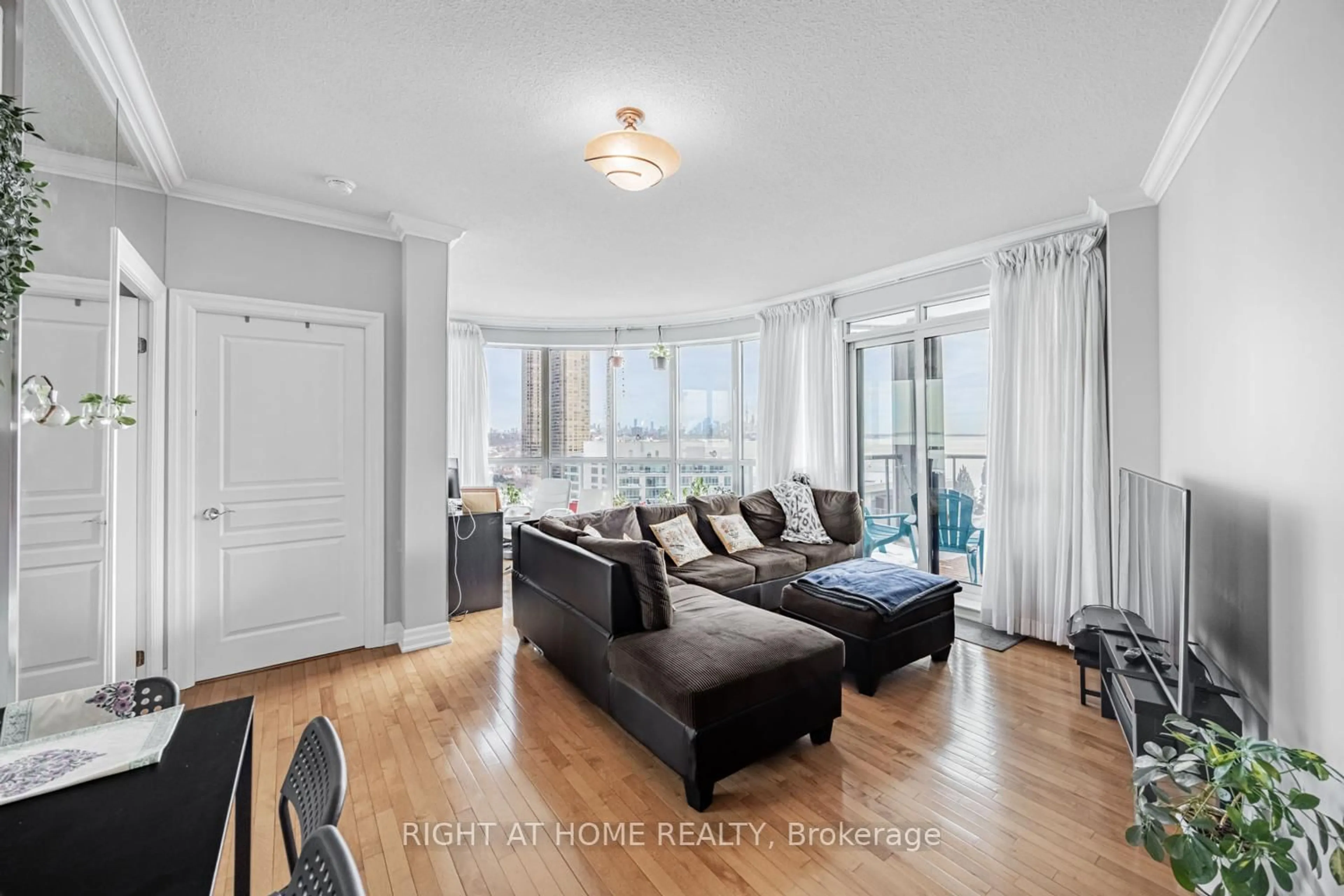 Living room with furniture, wood/laminate floor for 2087 Lake Shore Blvd #1503, Toronto Ontario M8V 4G3