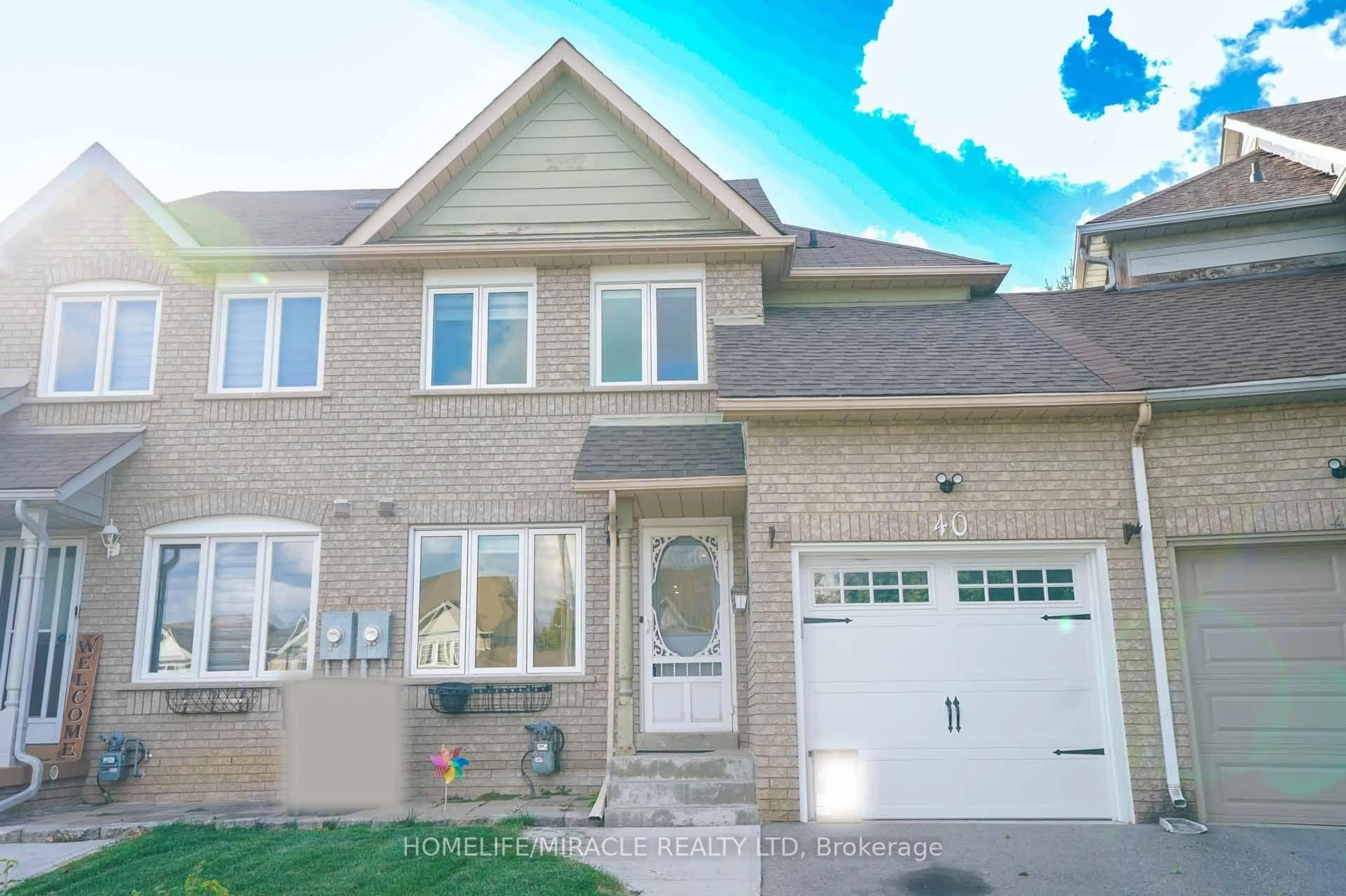 Home with brick exterior material, street for 40 Gardenia Way, Caledon Ontario L7C 1B2