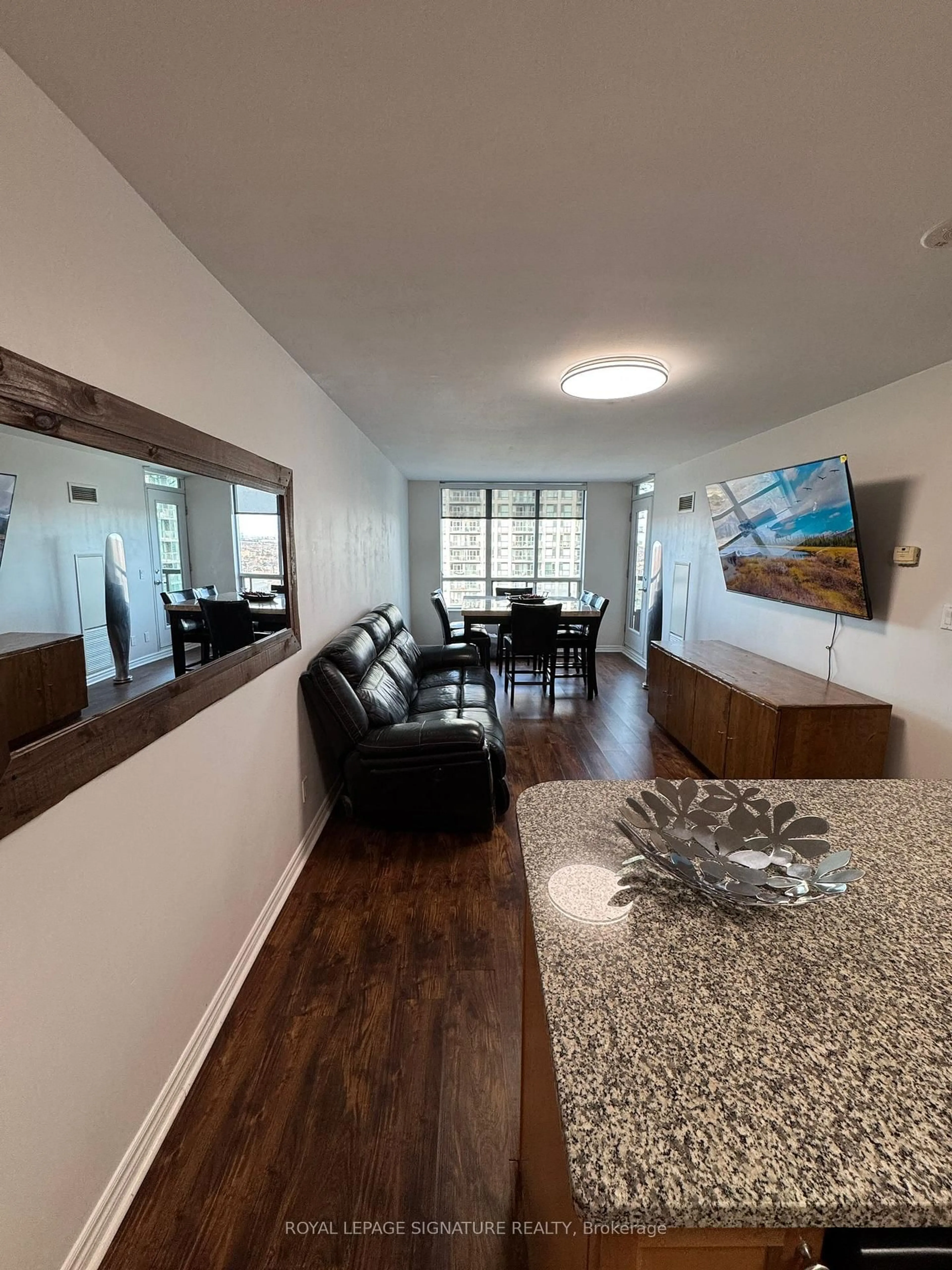 Living room with furniture, wood/laminate floor for 335 Rathburn Rd #1717, Mississauga Ontario L5B 0C8