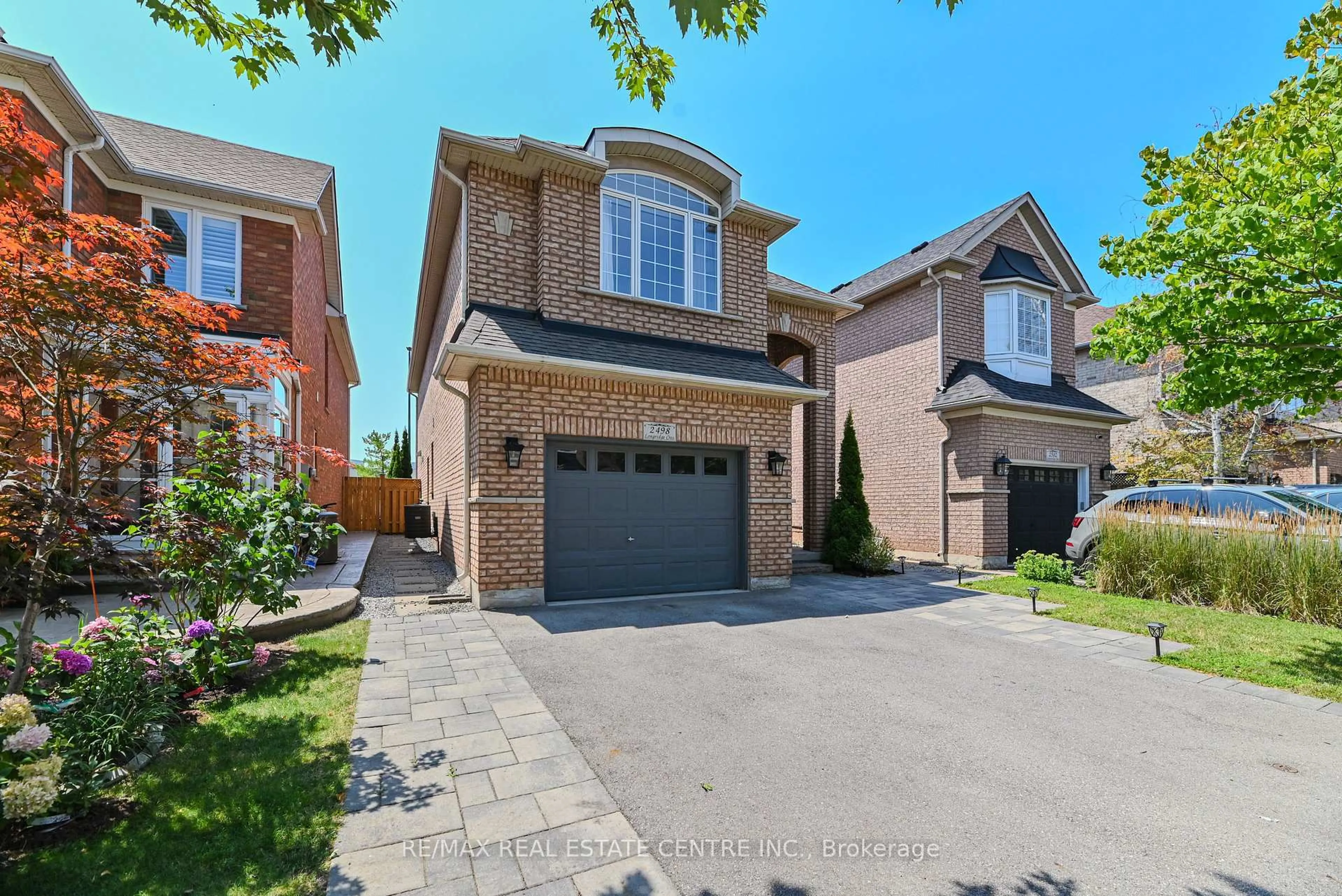 Home with brick exterior material, street for 2498 Longridge Cres, Oakville Ontario L6H 6S2