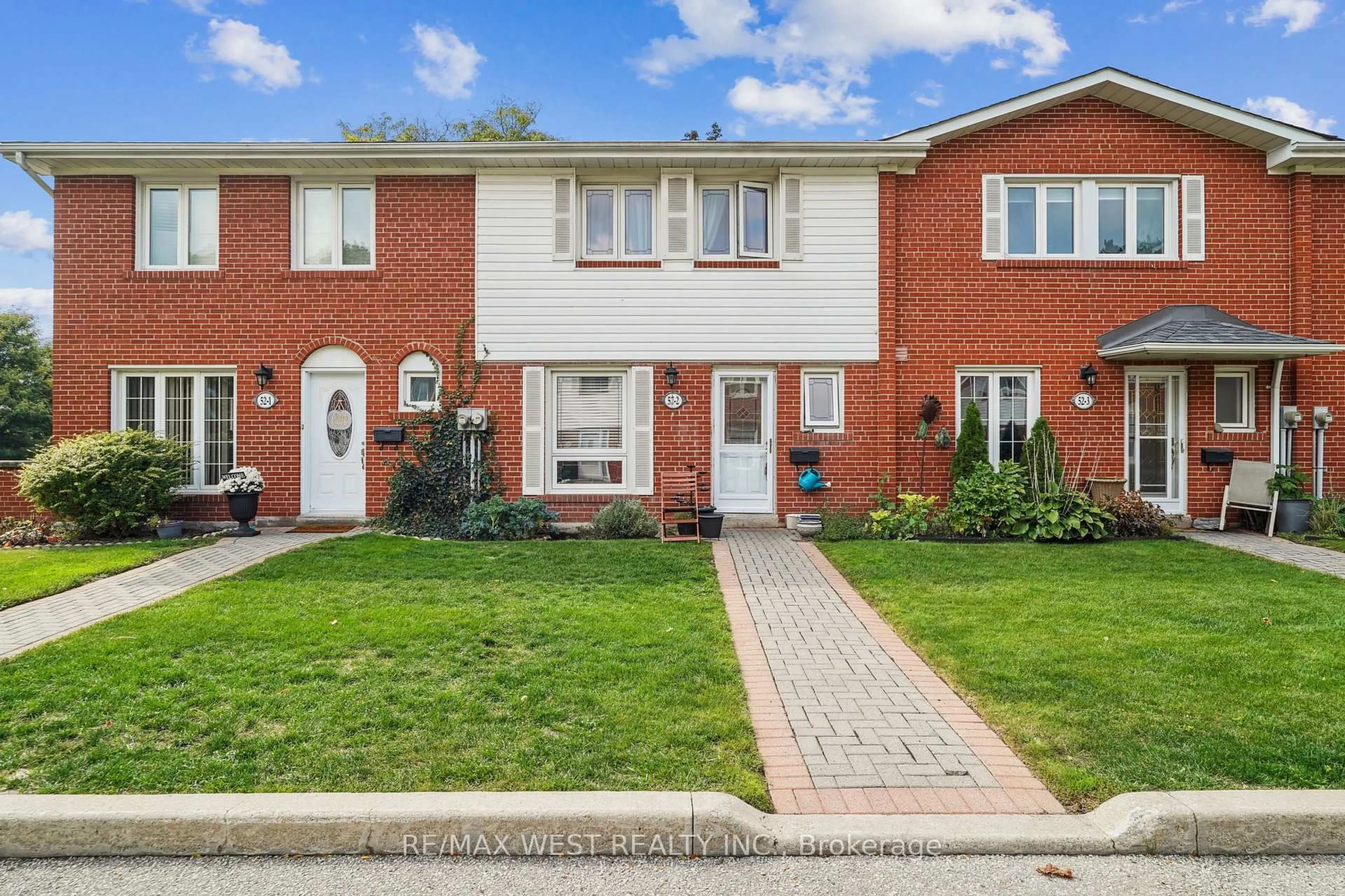 Home with brick exterior material, street for 52 Old Burnhamthorpe Rd #2, Toronto Ontario M9C 3J5