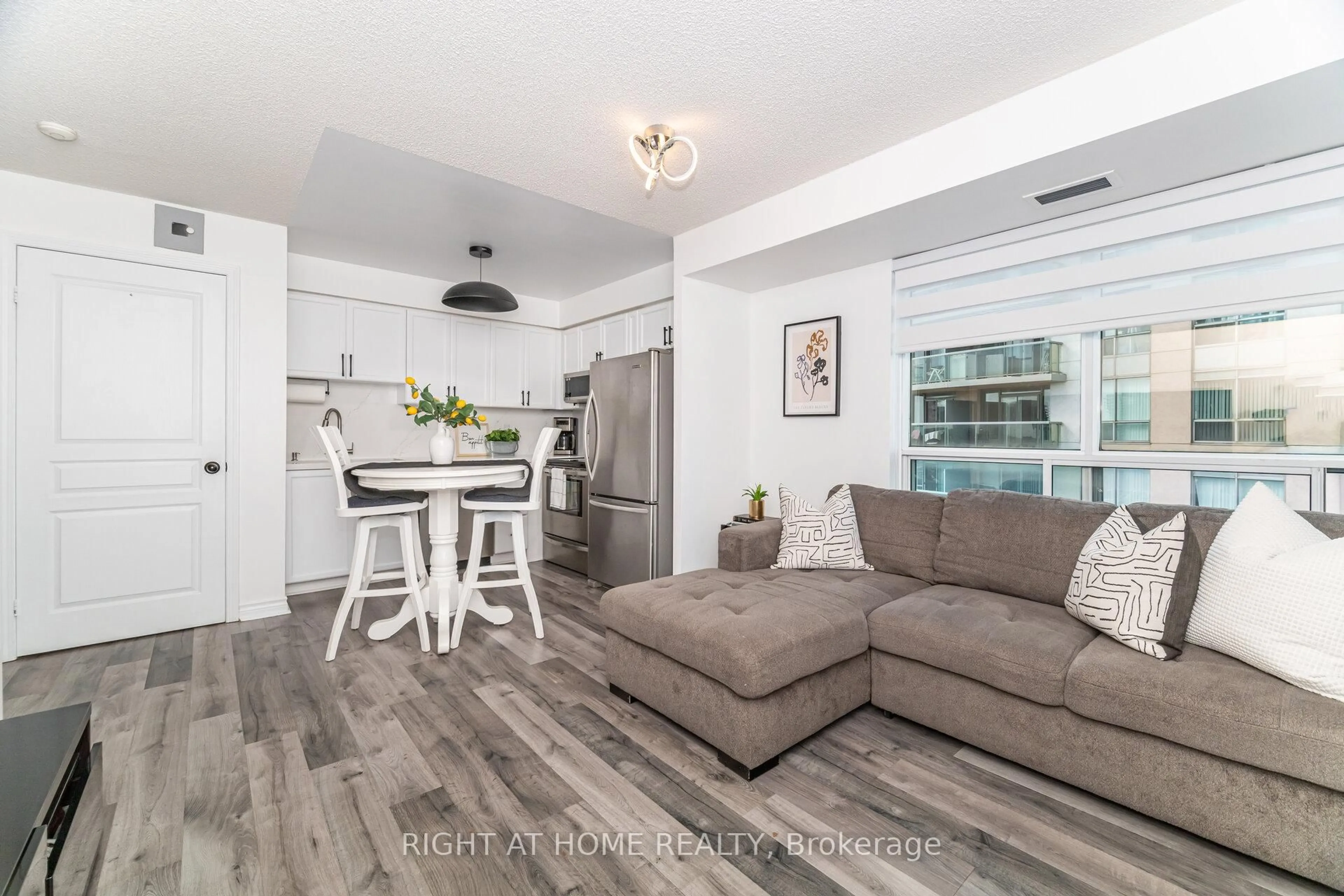 Living room with furniture, unknown for 2545 Erin Centre Blvd #1211, Mississauga Ontario L5M 6Z9