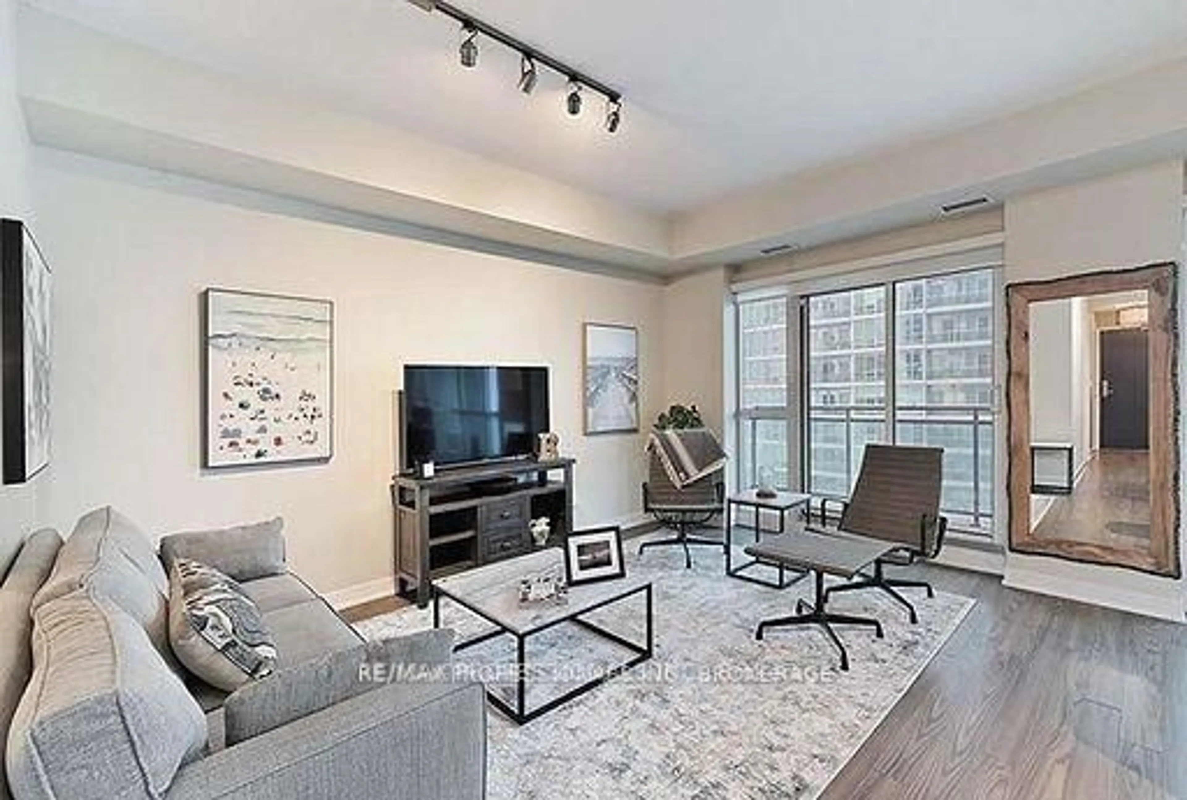 Living room with furniture, unknown for 165 Legion Rd #1733, Toronto Ontario M8Y 0B3