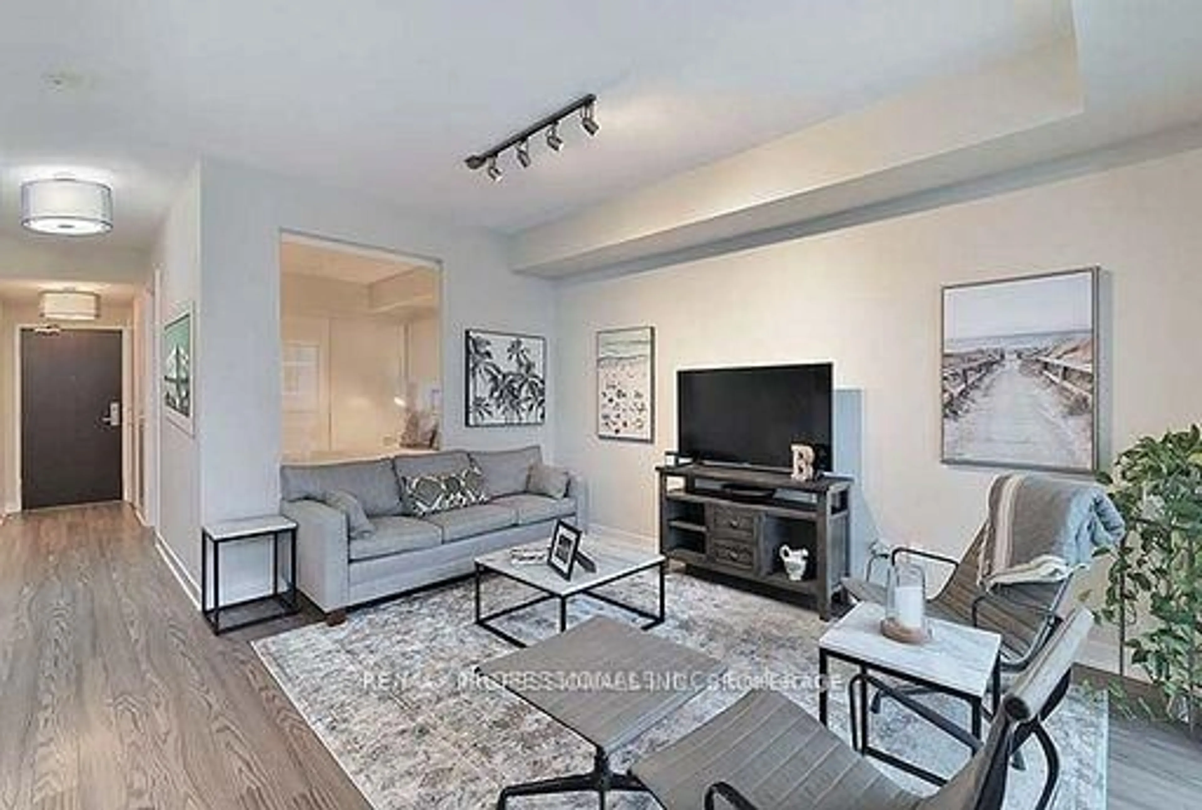 Living room with furniture, unknown for 165 Legion Rd #1733, Toronto Ontario M8Y 0B3