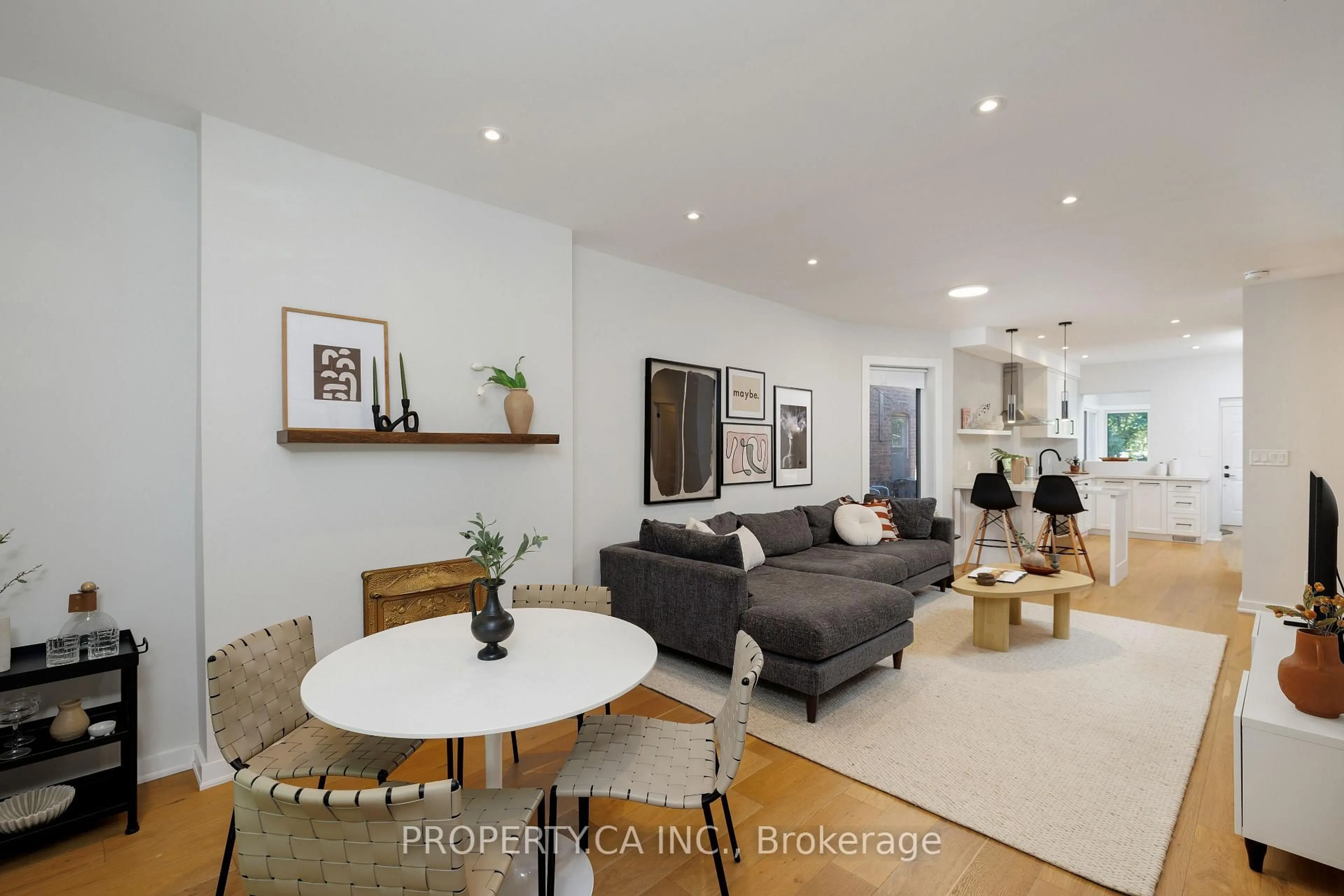 Living room with furniture, wood/laminate floor for 79 Macdonell Ave, Toronto Ontario M6R 2A4