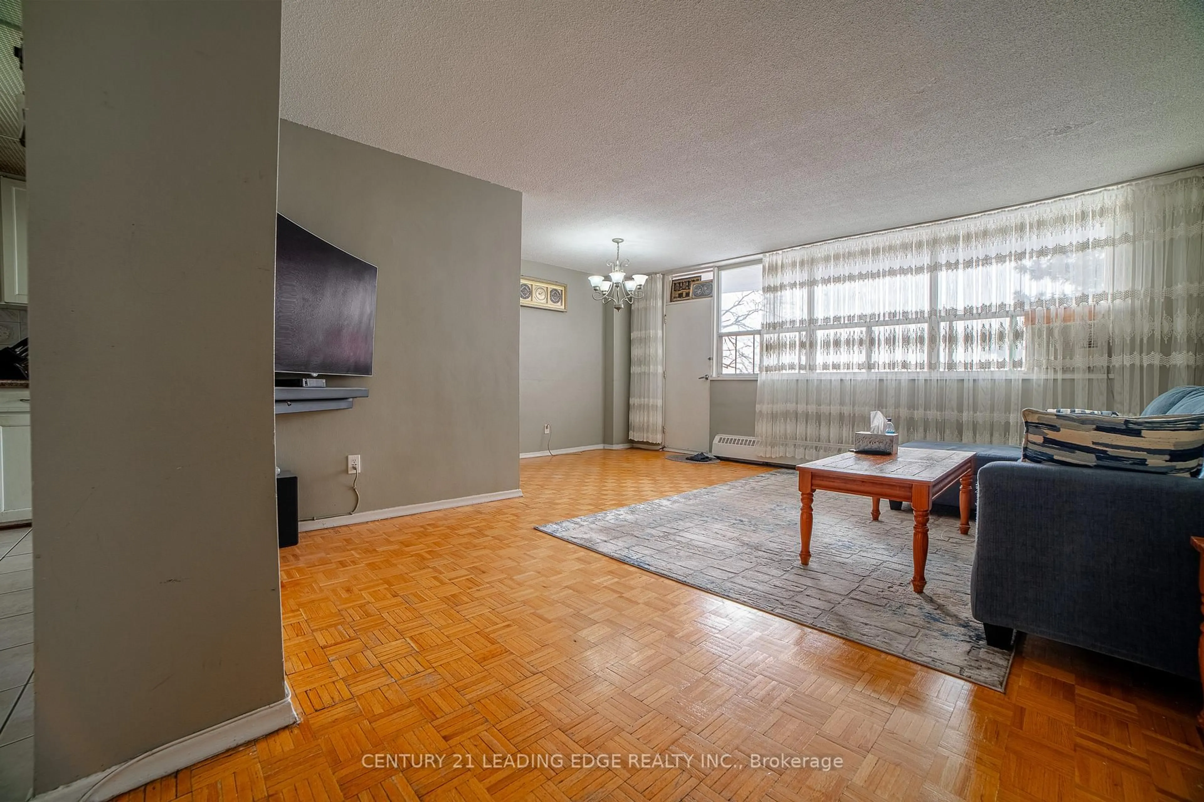 Living room with furniture, unknown for 80 Grandravine Dr #402, Toronto Ontario M3J 1B2
