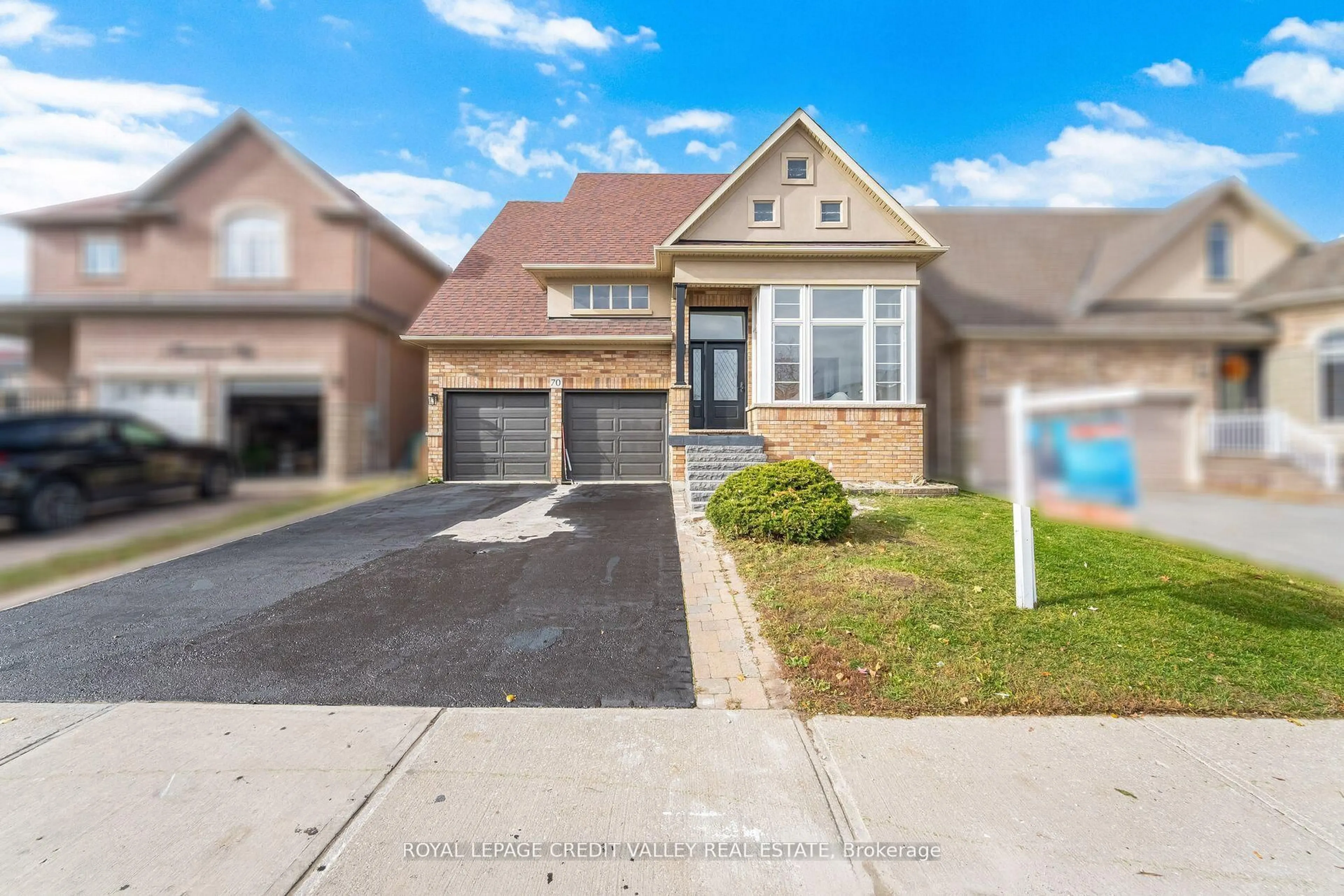 Home with brick exterior material, street for 70 Blue Diamond Dr, Brampton Ontario L6S 6K3