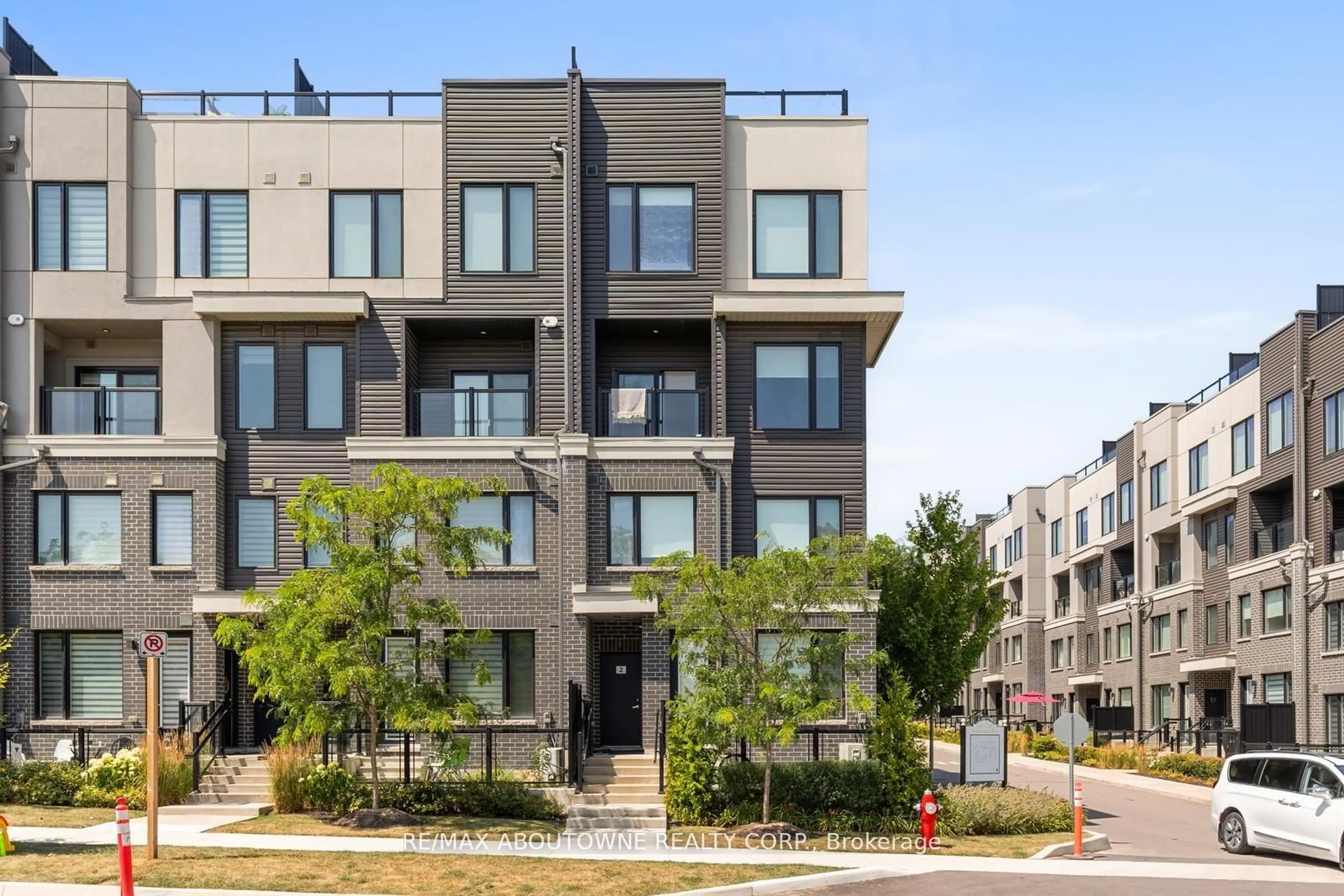 Home with brick exterior material, street for 3472 Widdicombe Way #2, Mississauga Ontario L5L 0B8