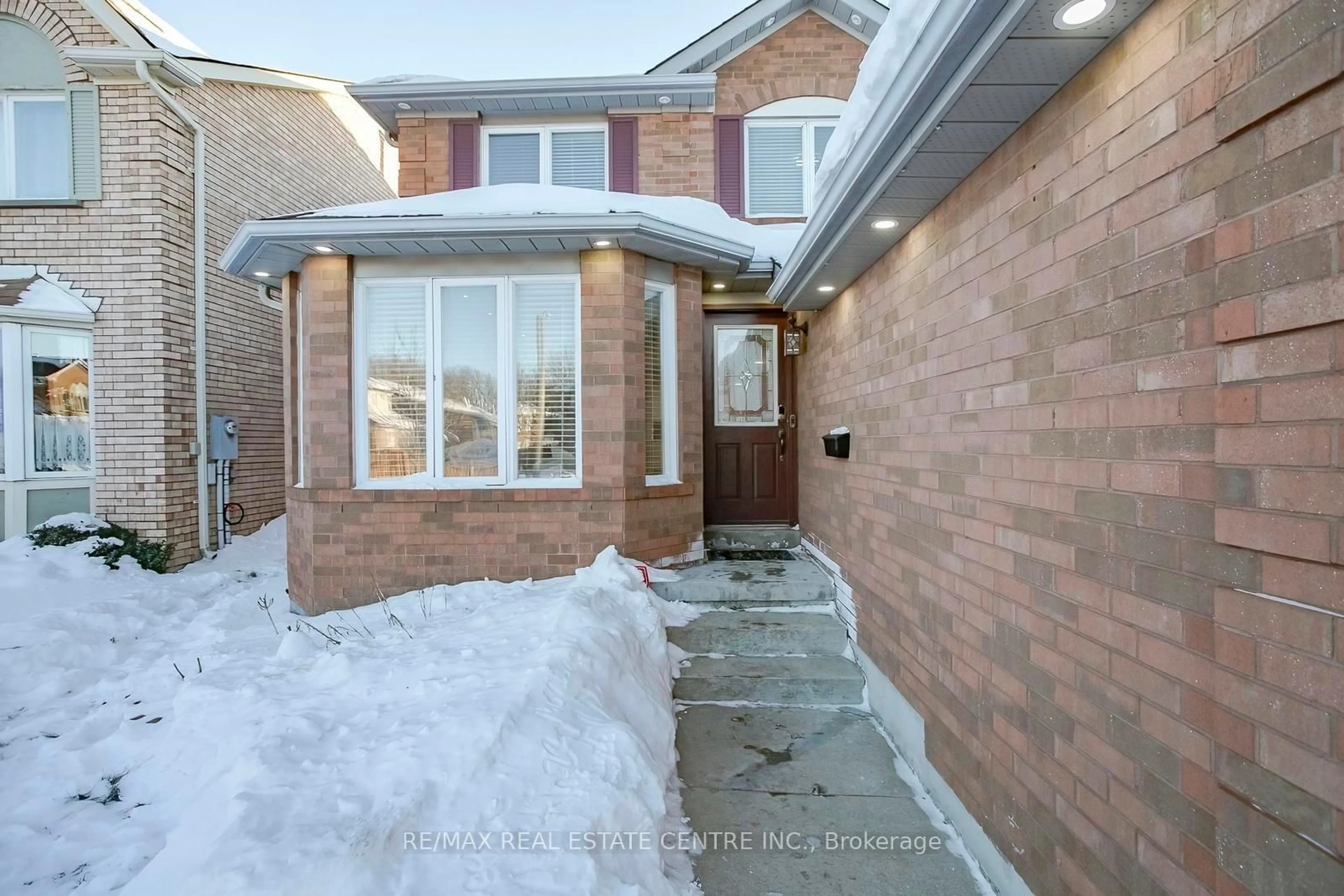 Home with brick exterior material, street for 37 Duggan Dr, Brampton Ontario L6Y 4J2