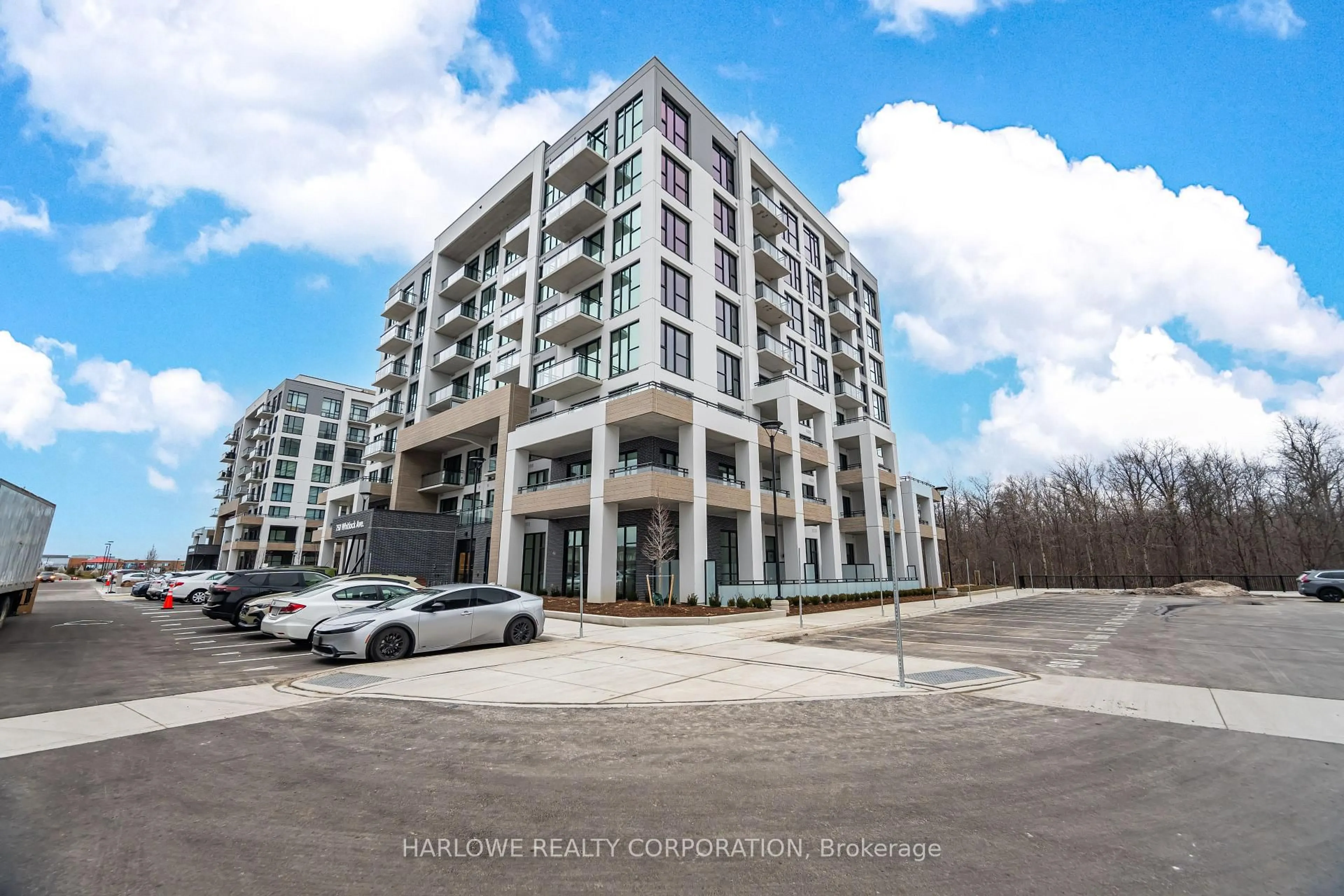 A pic from outside/outdoor area/front of a property/back of a property/a pic from drone, building for 750 Whitlock Ave #308, Milton Ontario L9E 1M4