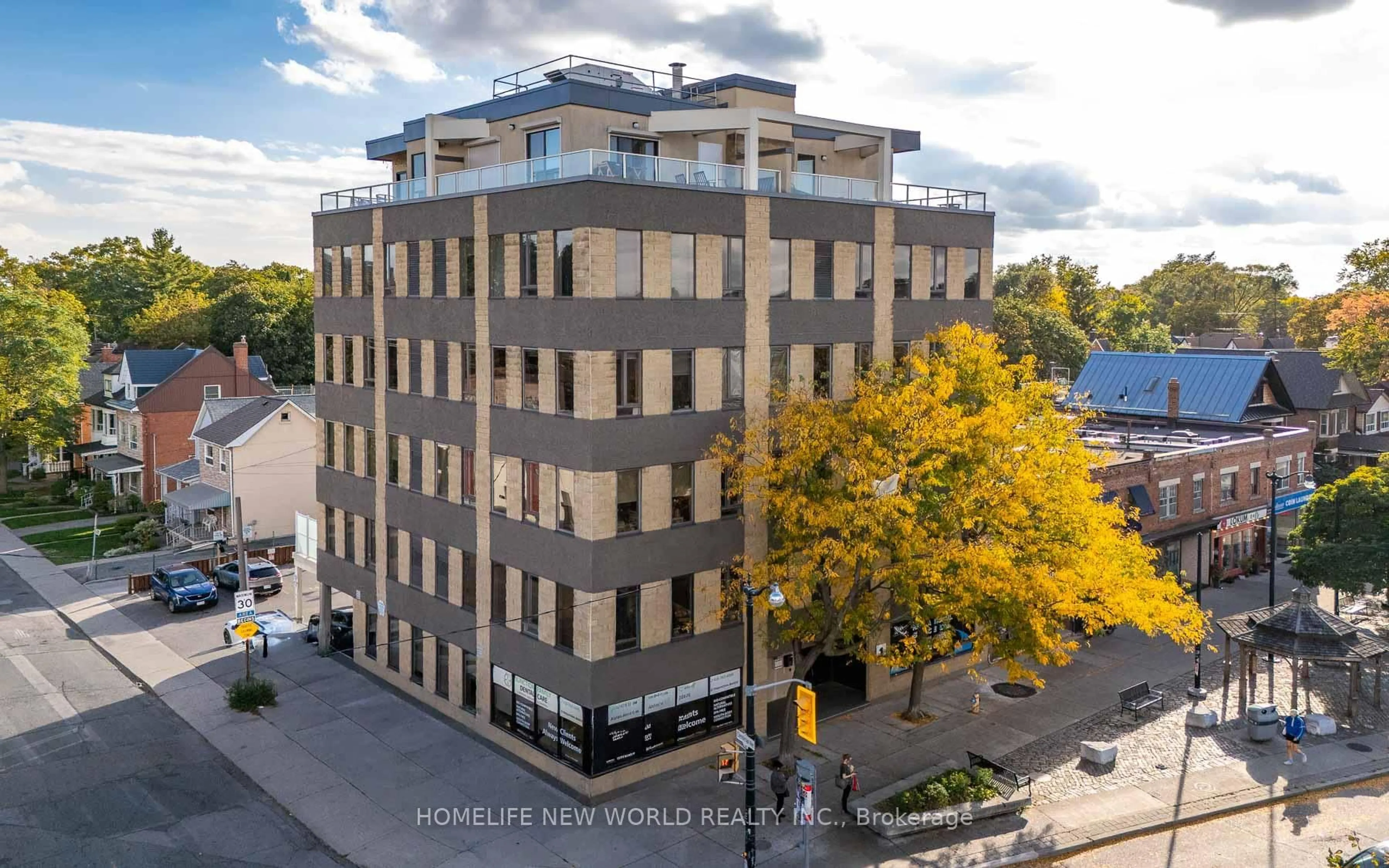 A pic from outside/outdoor area/front of a property/back of a property/a pic from drone, building for 1 St Johns Rd #303, Toronto Ontario M6P 4C7