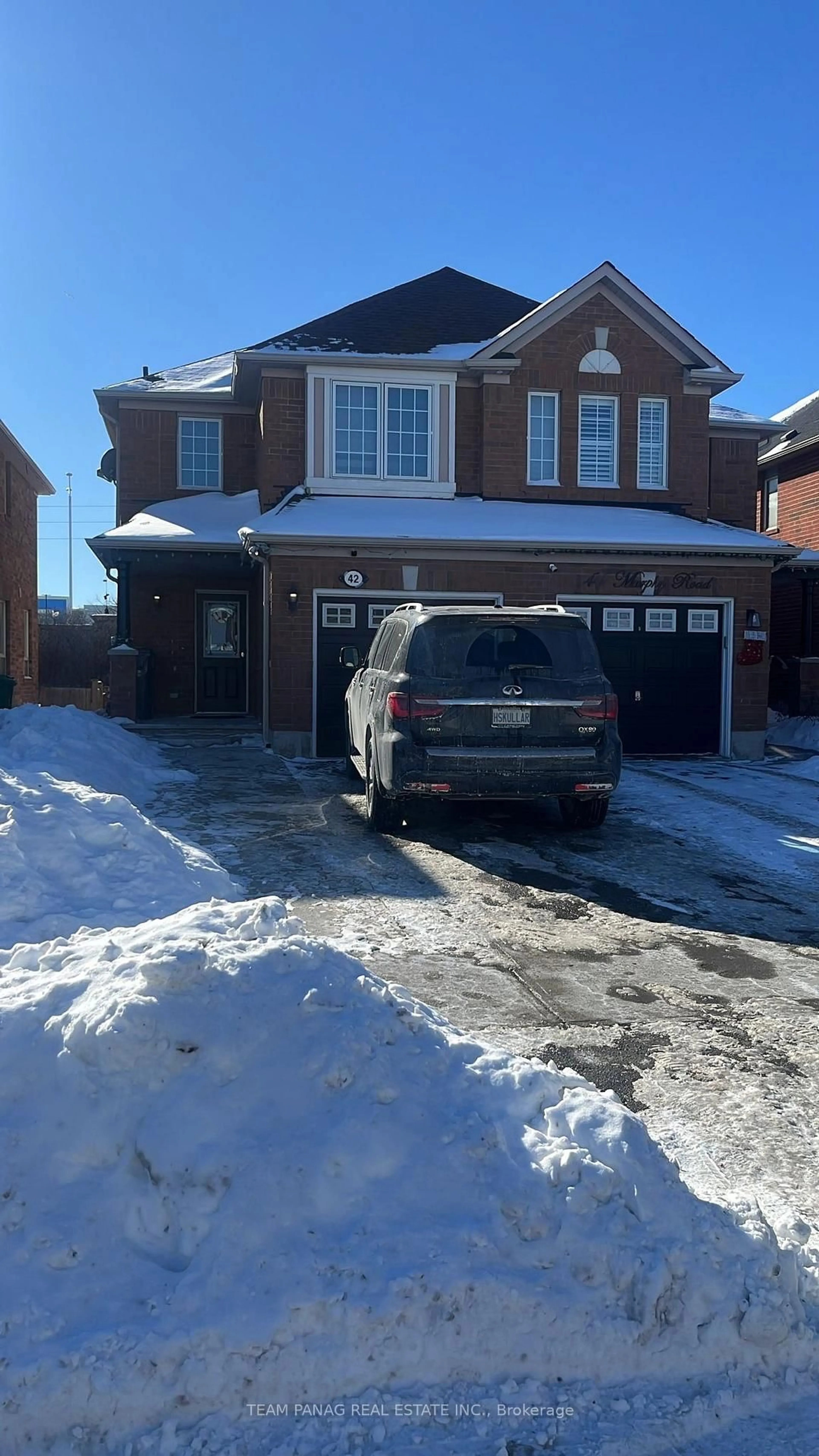 Home with brick exterior material, street for 42 Murphy Rd, Brampton Ontario L6S 0B1