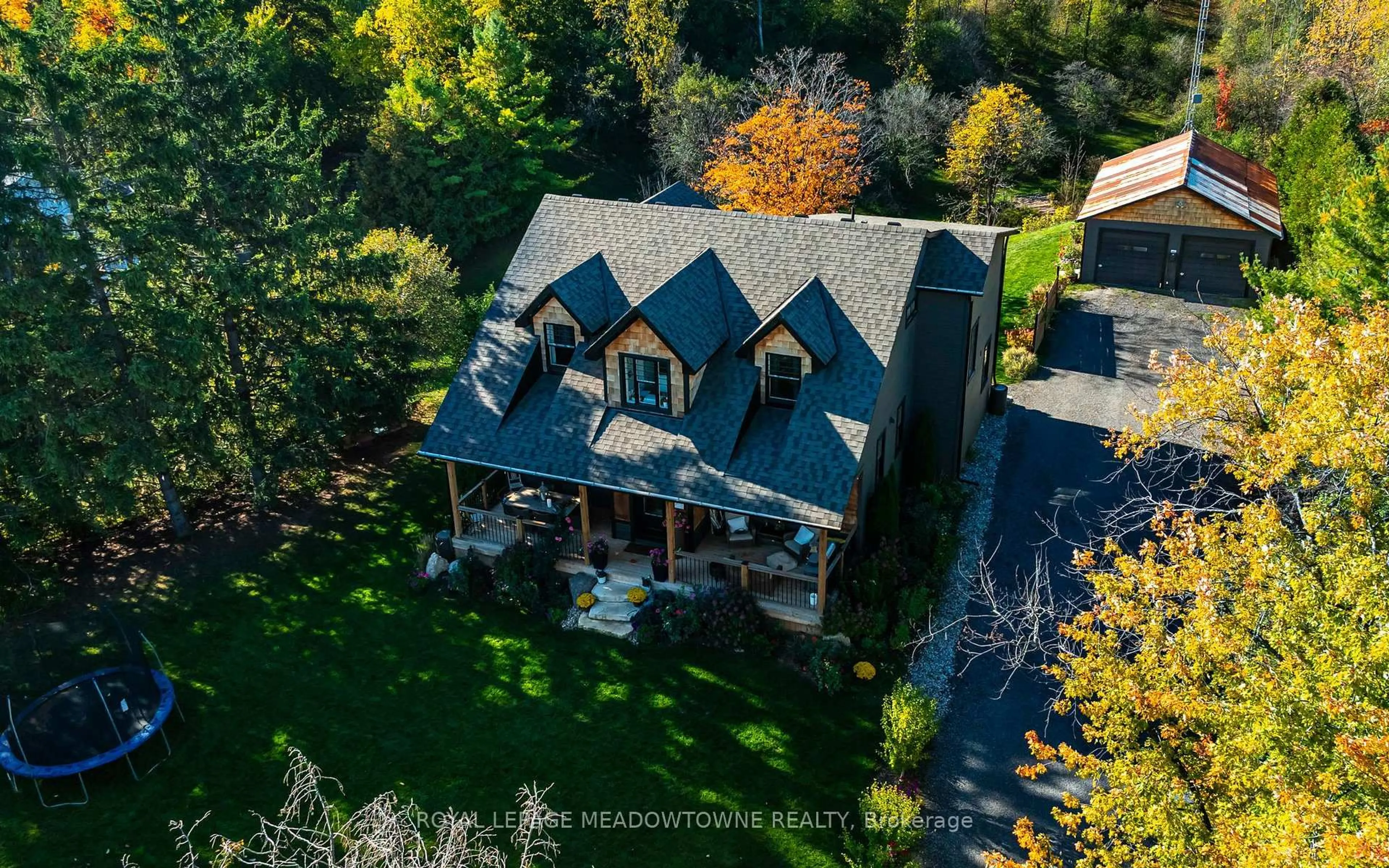 A pic from outside/outdoor area/front of a property/back of a property/a pic from drone, unknown for 13394 Tenth Line, Halton Hills Ontario L7G 4S8