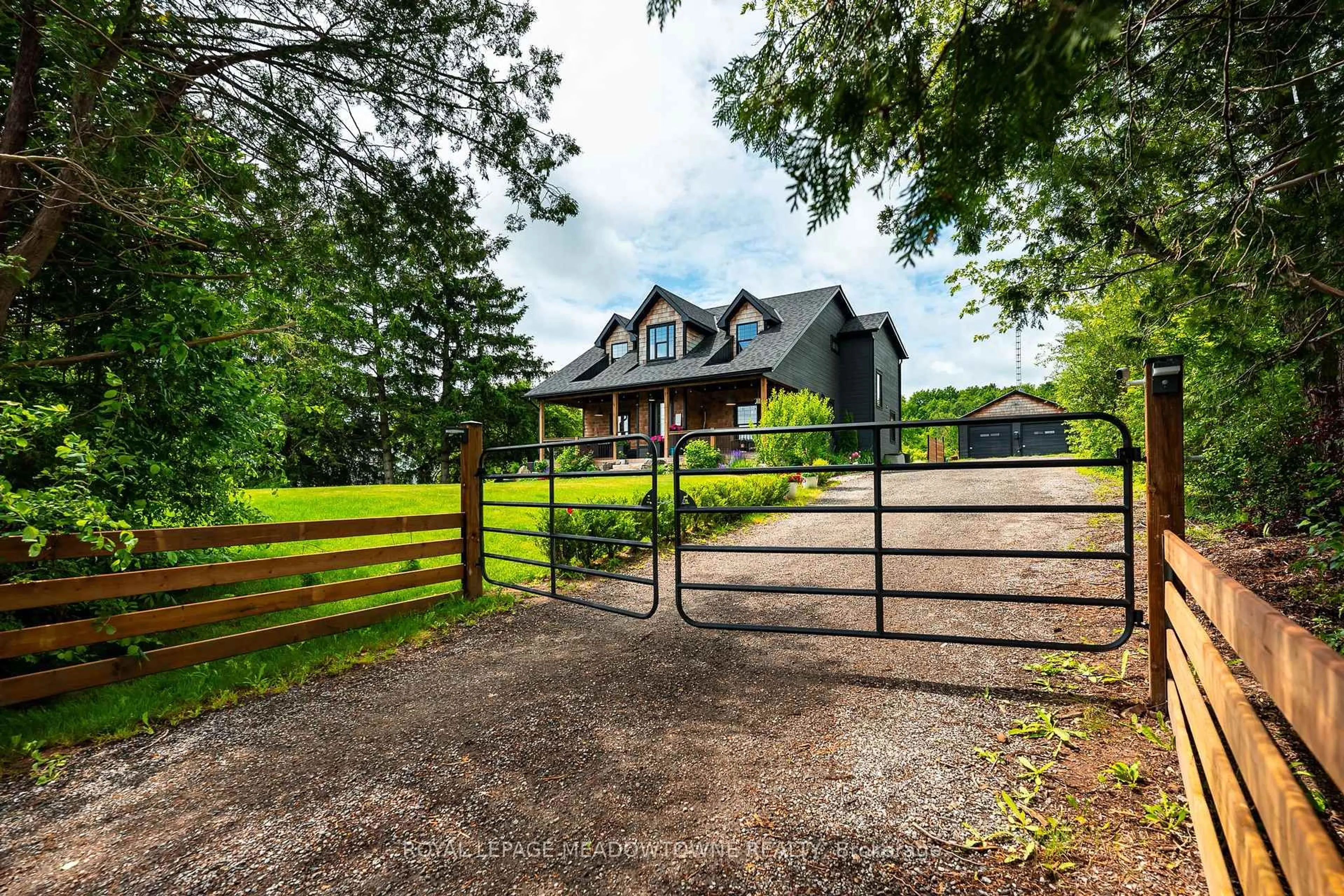 A pic from outside/outdoor area/front of a property/back of a property/a pic from drone, unknown for 13394 Tenth Line, Halton Hills Ontario L7G 4S8