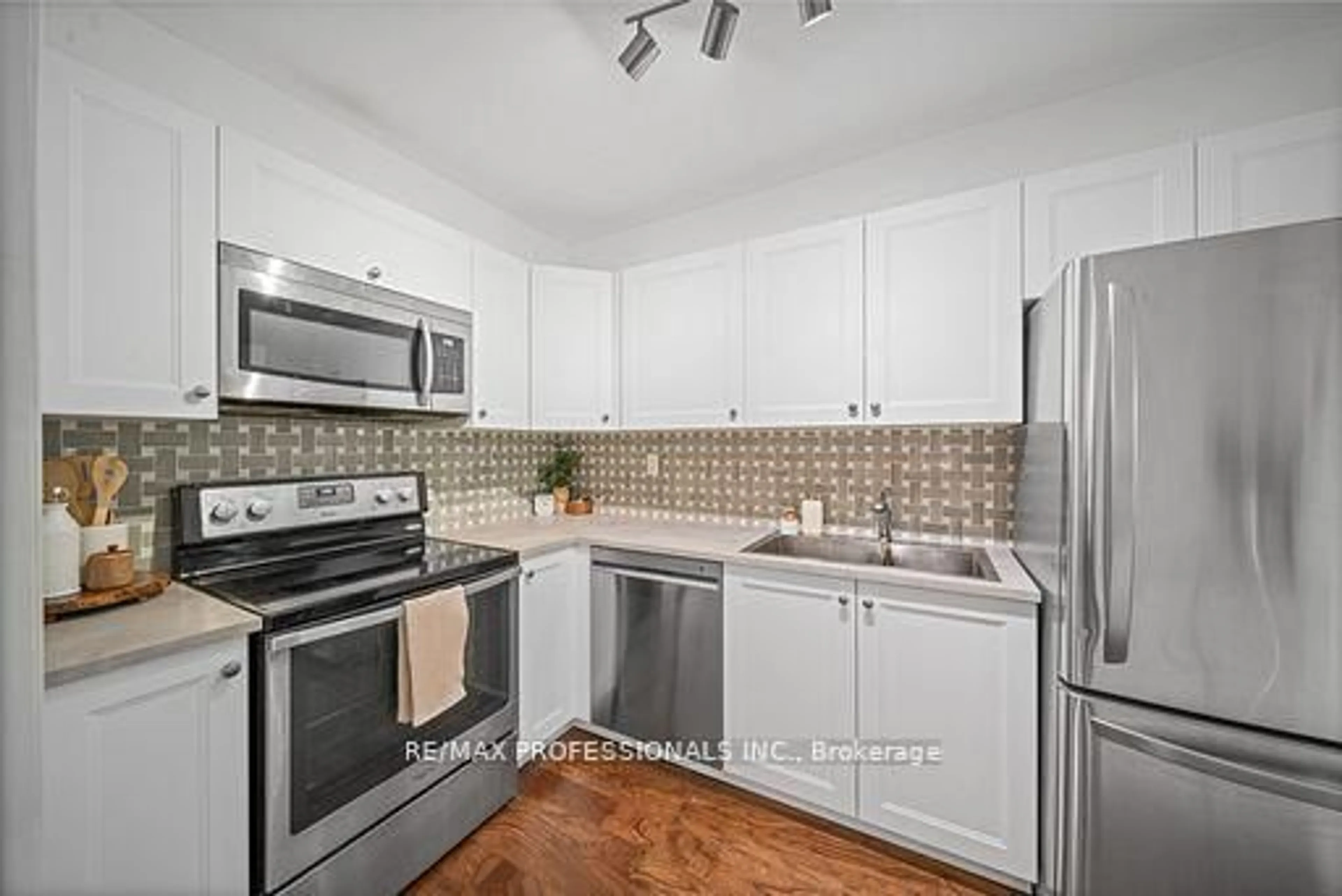 Standard kitchen, ceramic/tile floor for 100 Coe Hill Dr #216, Toronto Ontario M6S 3E1