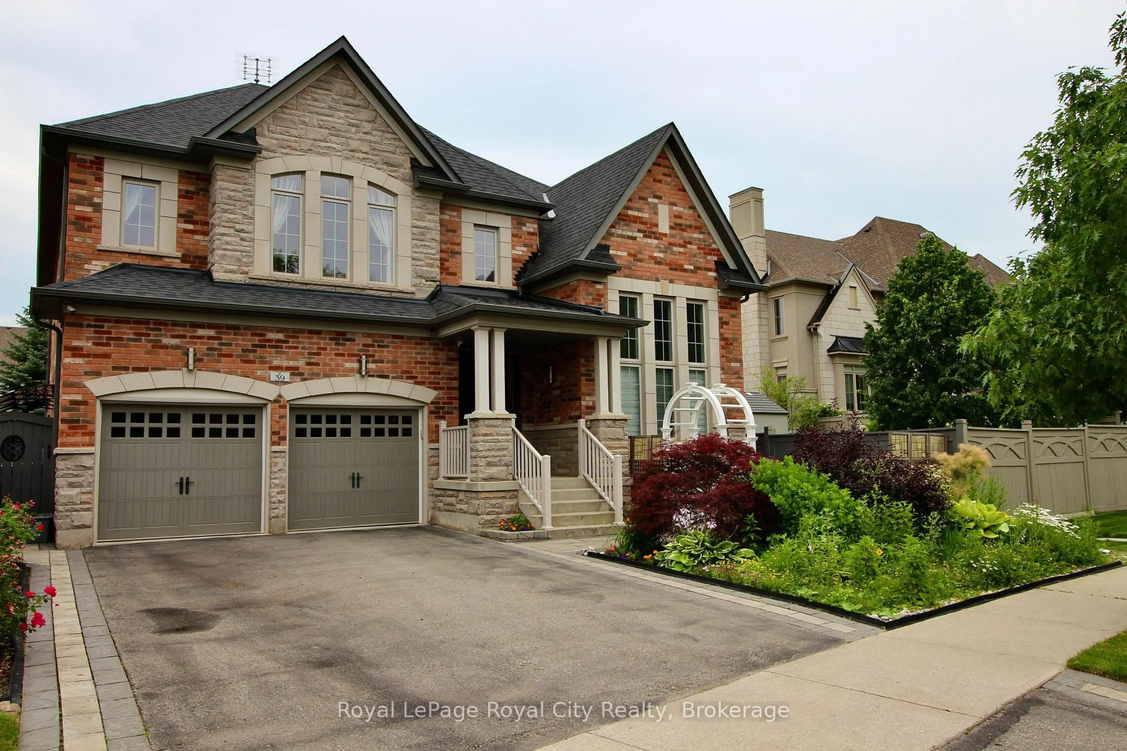 Home with brick exterior material, street for 39 Dalmeny Dr, Brampton Ontario L6X 2Y4