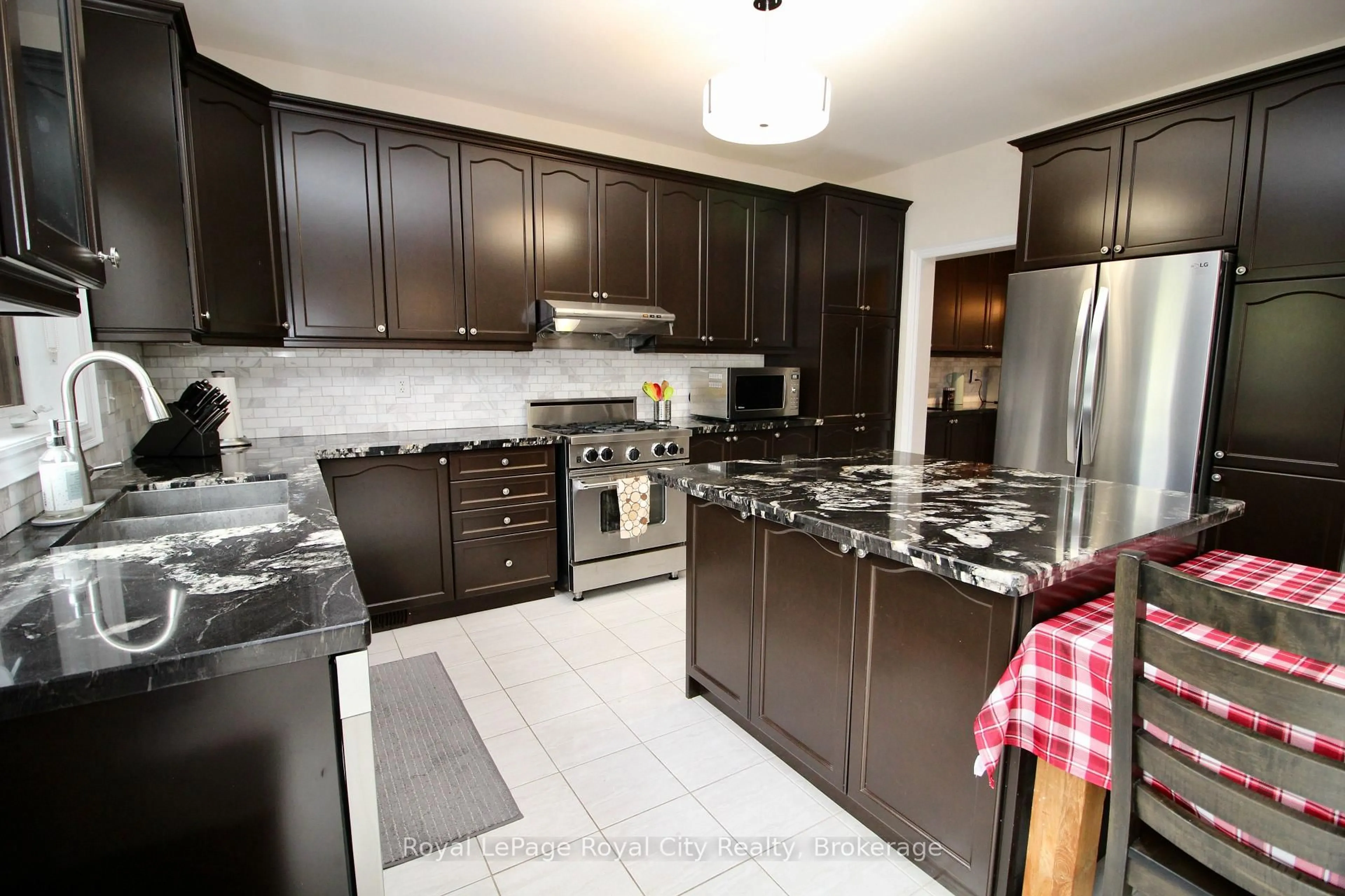 Contemporary kitchen, ceramic/tile floor for 39 Dalmeny Dr, Brampton Ontario L6X 2Y4