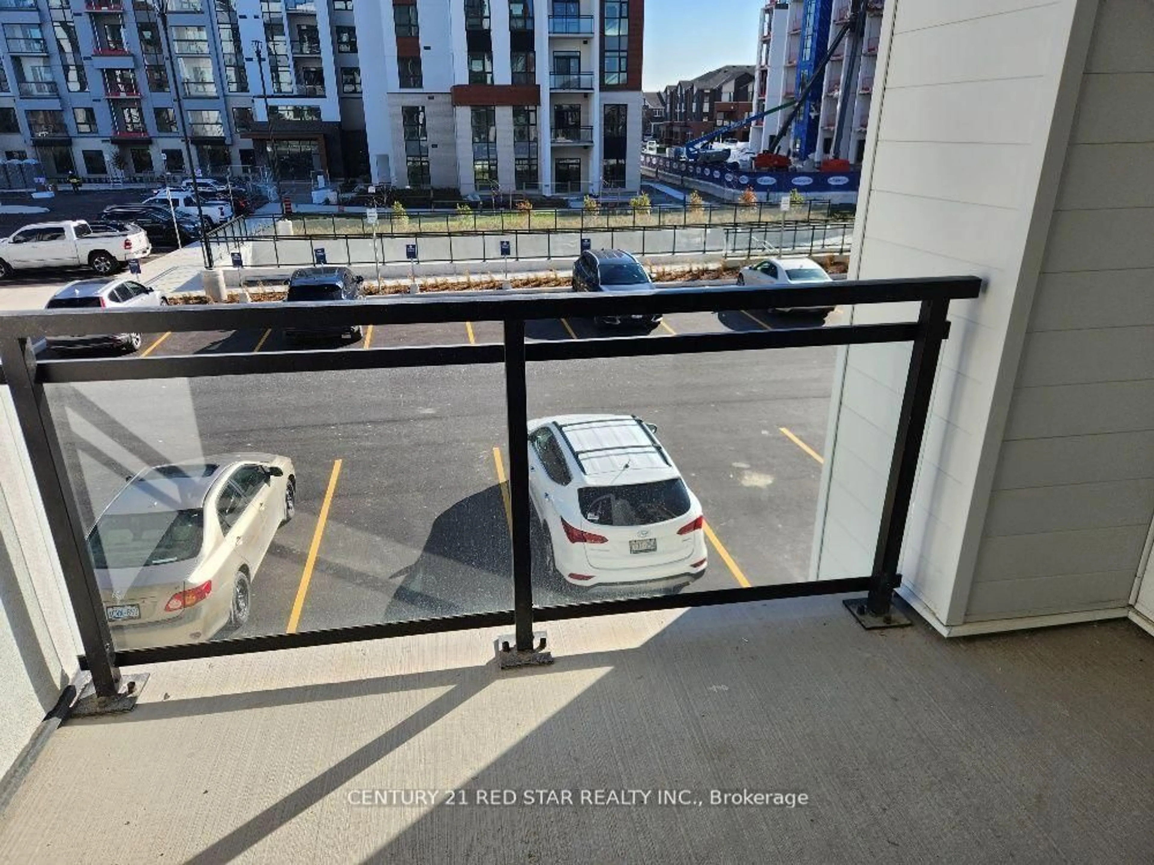 Balcony in the apartment, city buildings view from balcony for 460 Gordon Krantz Ave #214, Milton Ontario L9E 1Z2