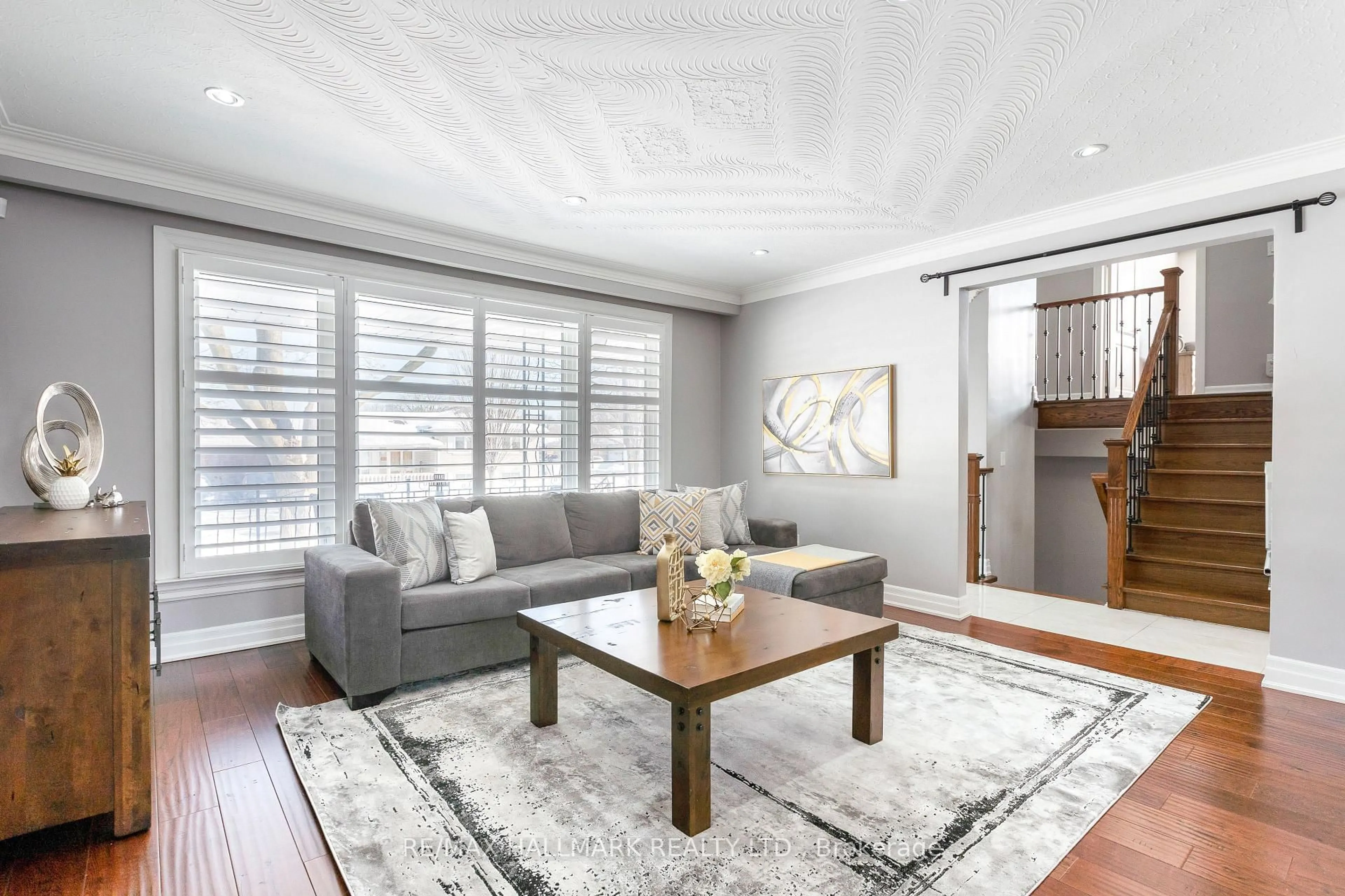 Living room with furniture, wood/laminate floor for 16 Marblehead Rd, Toronto Ontario M9R 3B6