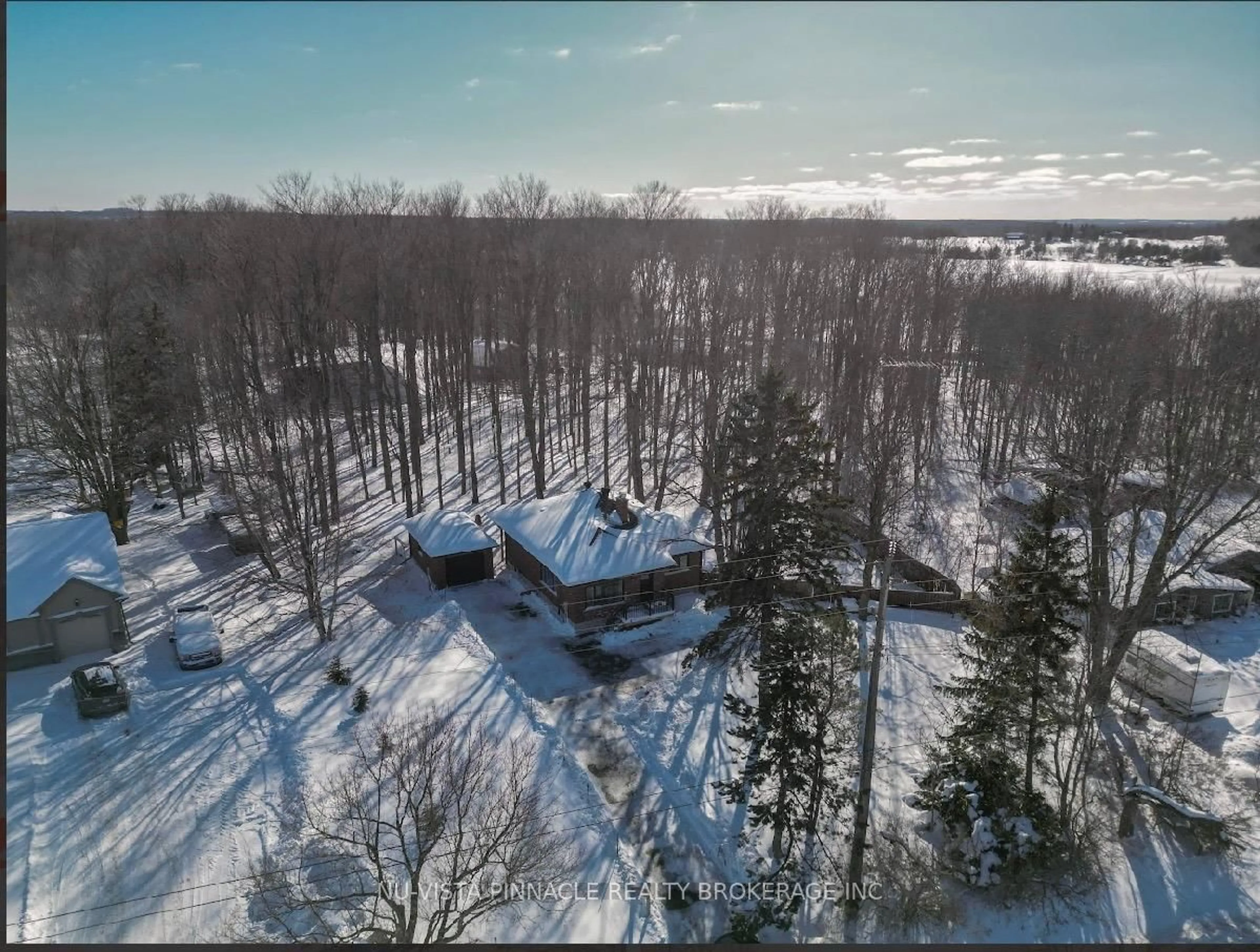 A pic from outside/outdoor area/front of a property/back of a property/a pic from drone, forest/trees view for 7142 HIGHWAY 7, Halton Hills Ontario L7J 2L9