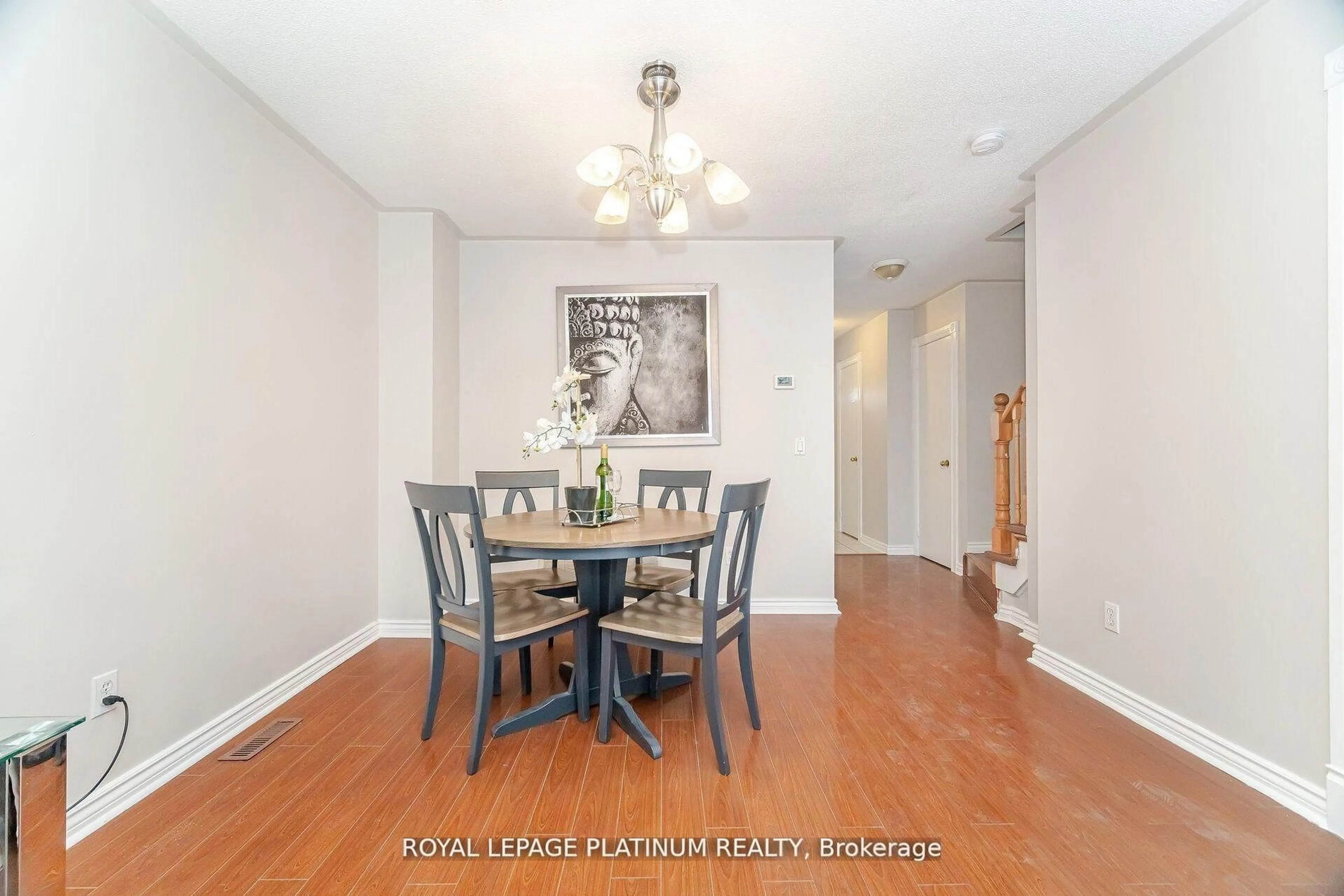 Dining room, wood/laminate floor for 51 Softneedle Ave, Brampton Ontario L6R 1K7