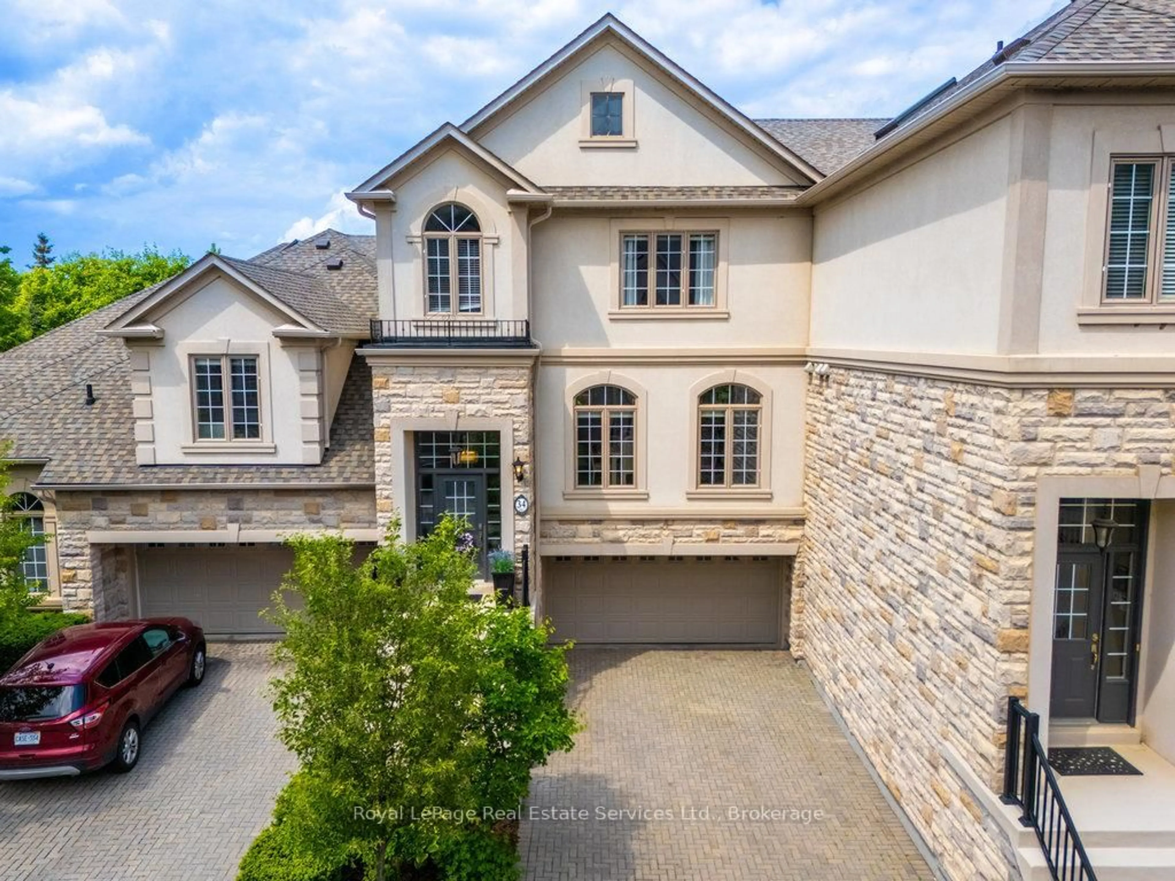 Home with brick exterior material, street for 2400 Neyagawa Blvd #34, Oakville Ontario L6H 7P5