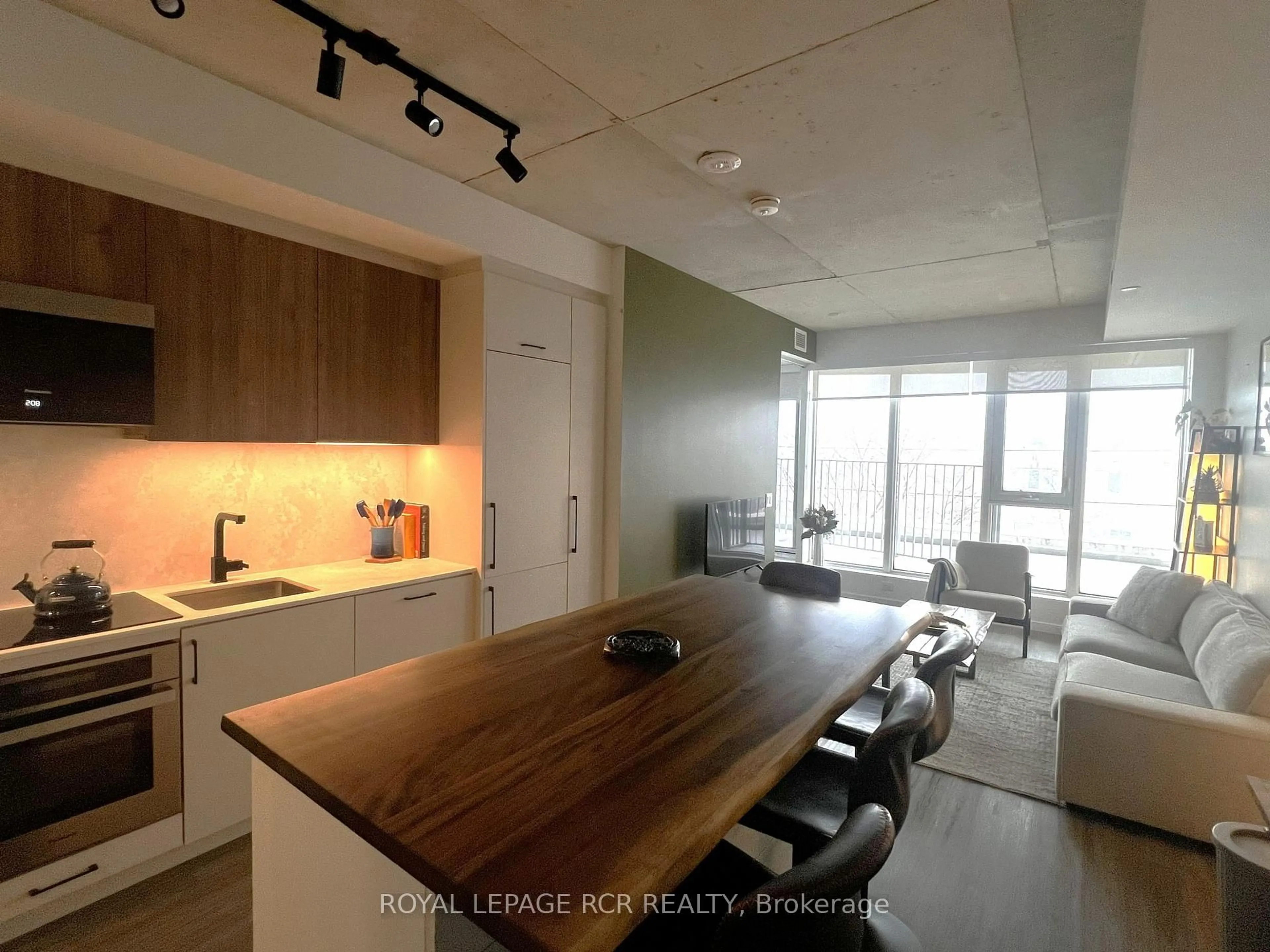 Open concept kitchen, wood/laminate floor for 689 The Queenway #321, Toronto Ontario M8Y 0C8