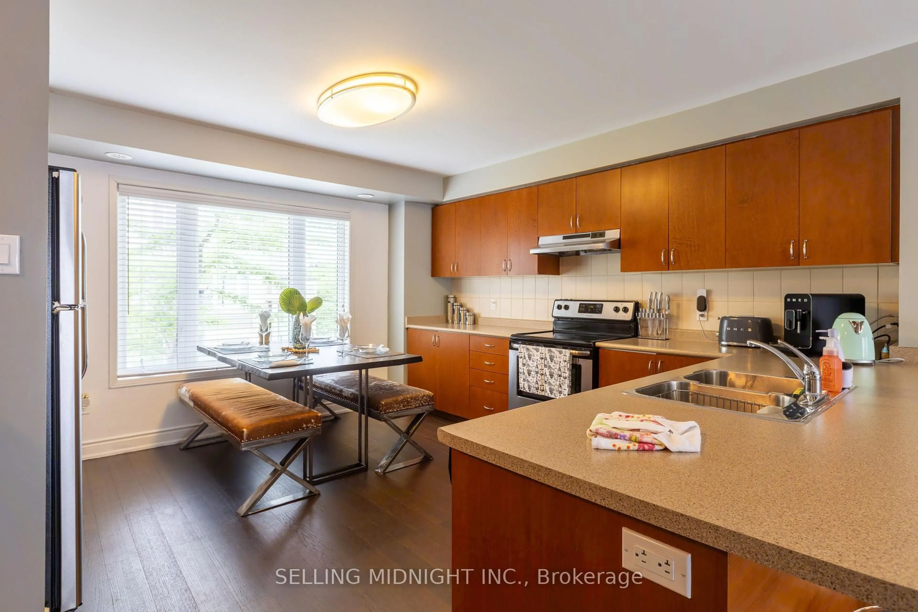 Open concept kitchen, wood/laminate floor for 5650 Winston Churchill Blvd #20, Mississauga Ontario L5M 0L8