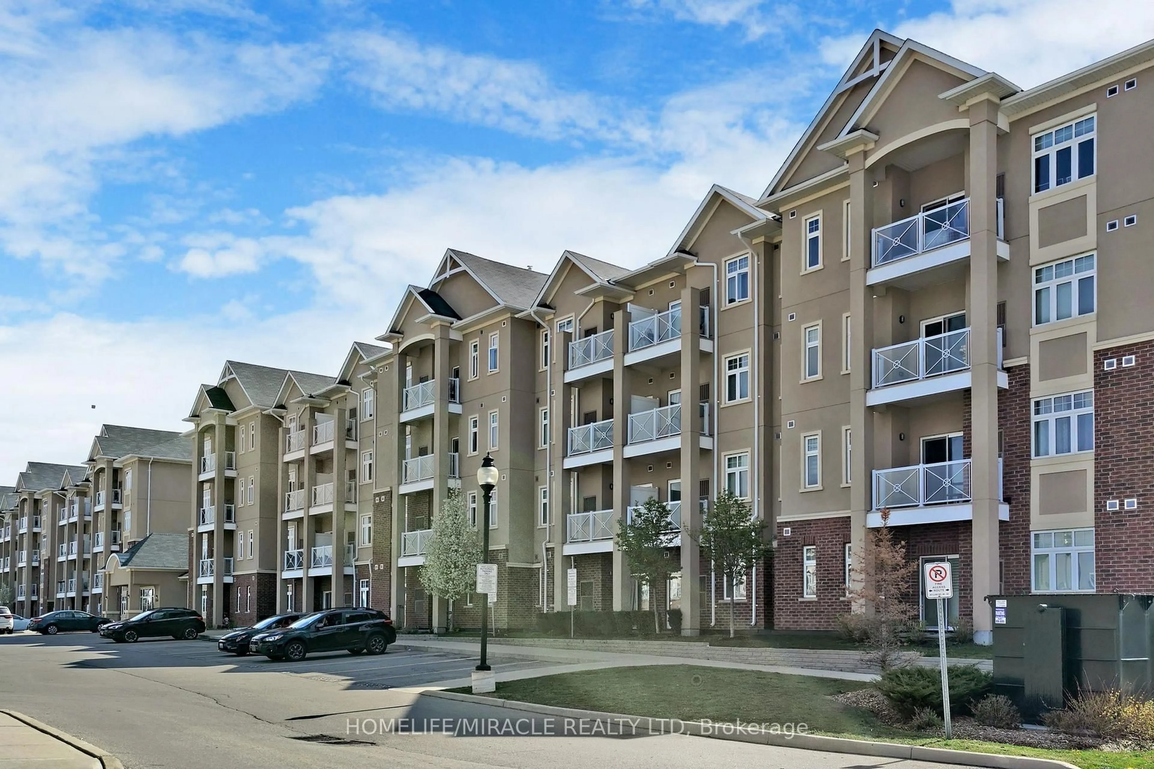 A pic from outside/outdoor area/front of a property/back of a property/a pic from drone, unknown for 1370 Costigan Rd #402, Milton Ontario L9T 0Y7