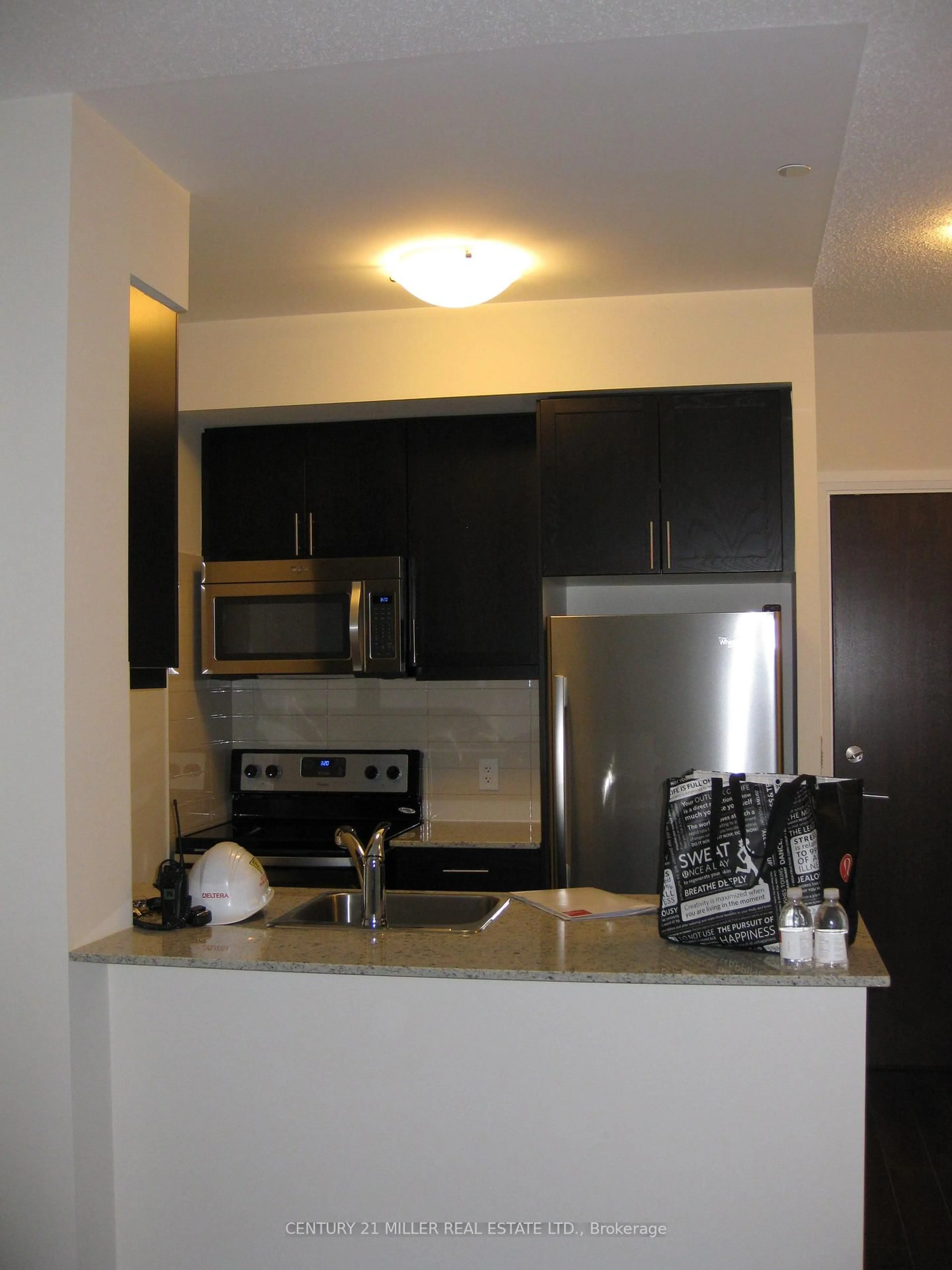 Standard kitchen, unknown for 6 Eva Rd #111, Toronto Ontario M9C 0B1