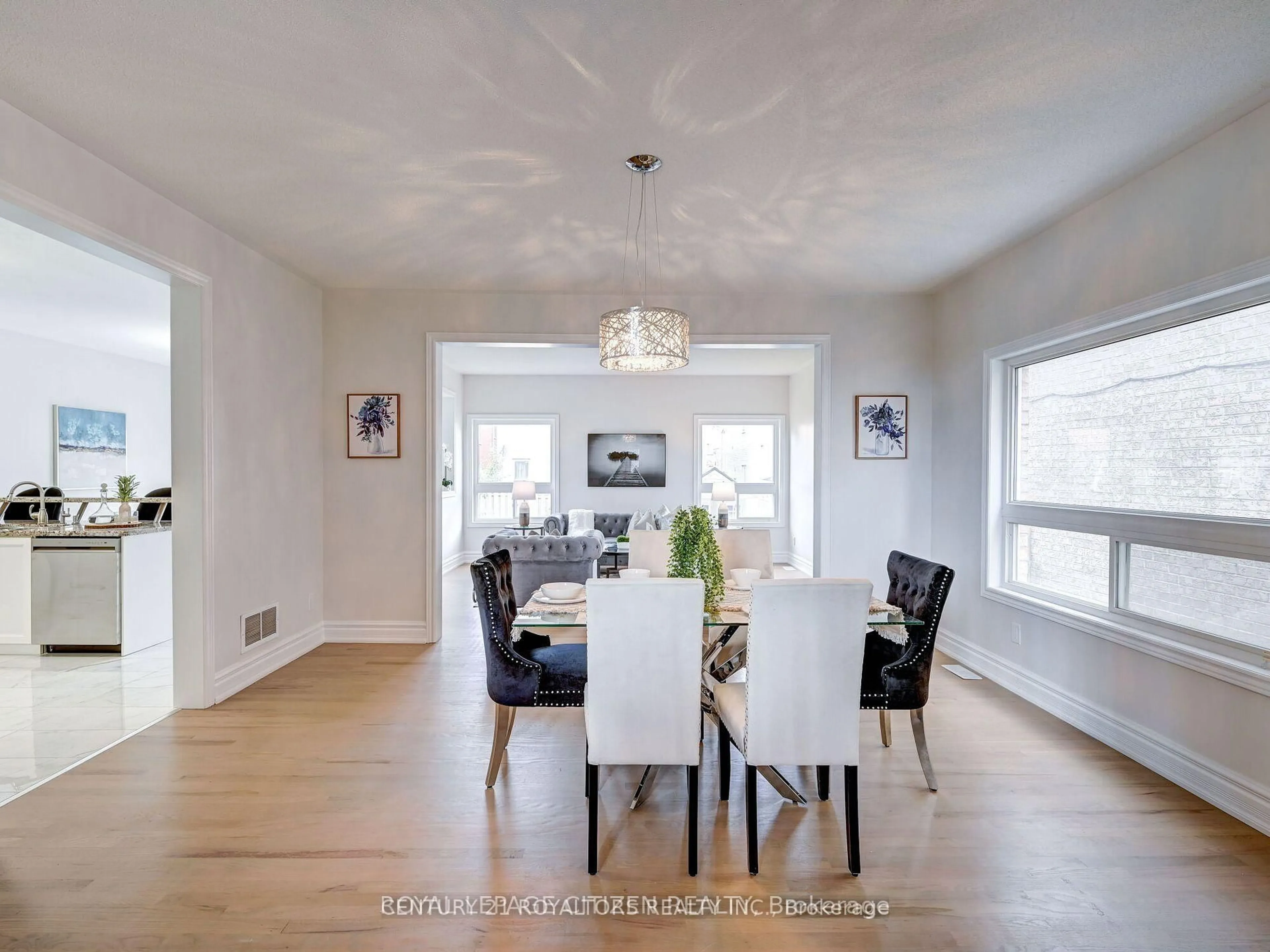 Dining room, wood/laminate floor for 86 Game Creek Cres, Brampton Ontario L7A 0J3