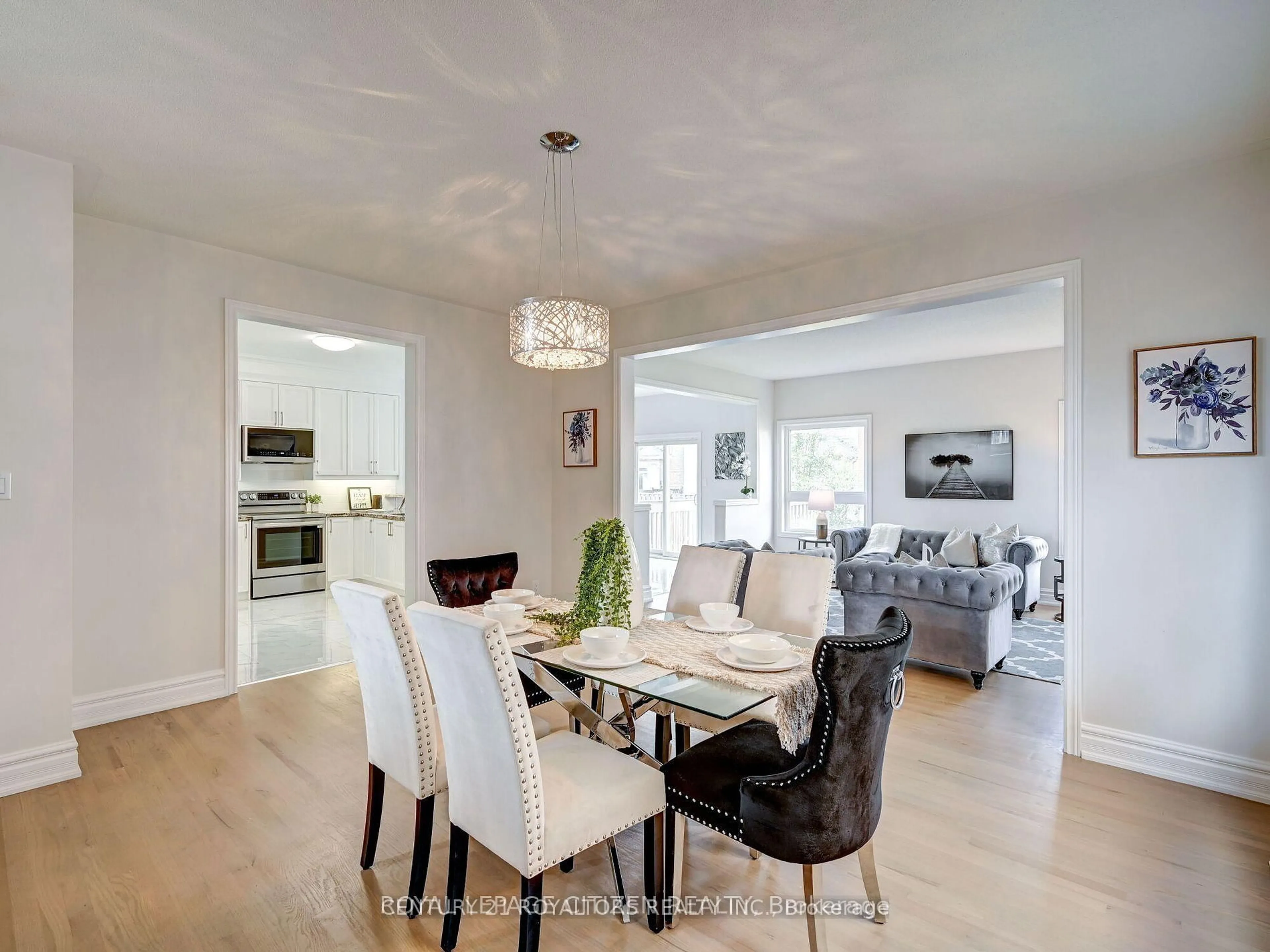 Dining room, wood/laminate floor for 86 Game Creek Cres, Brampton Ontario L7A 0J3