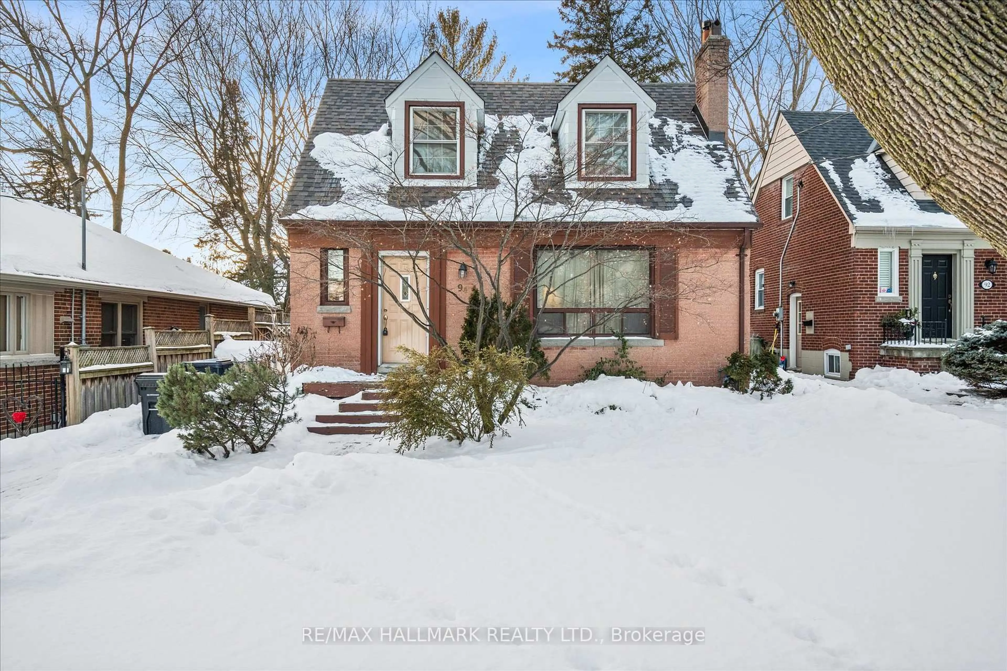 Home with brick exterior material, street for 94 Ballacaine Dr, Toronto Ontario M8Y 4B8