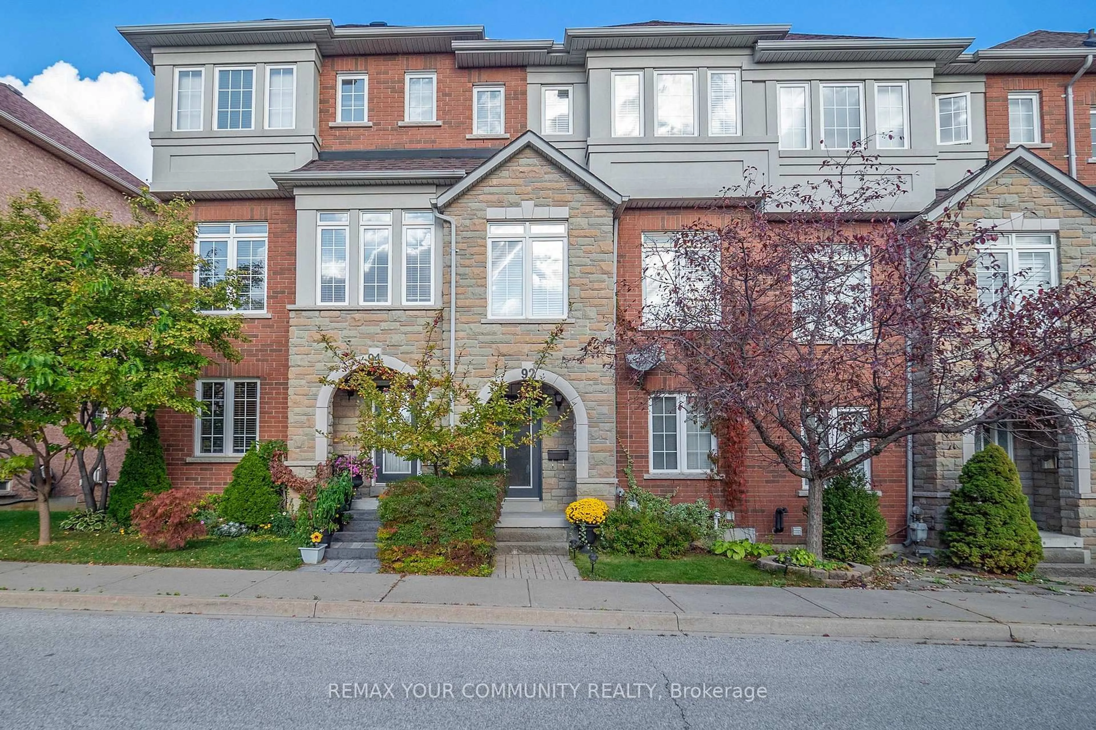 Home with brick exterior material, street for 92 Ramage Lane, Toronto Ontario M9C 5S6