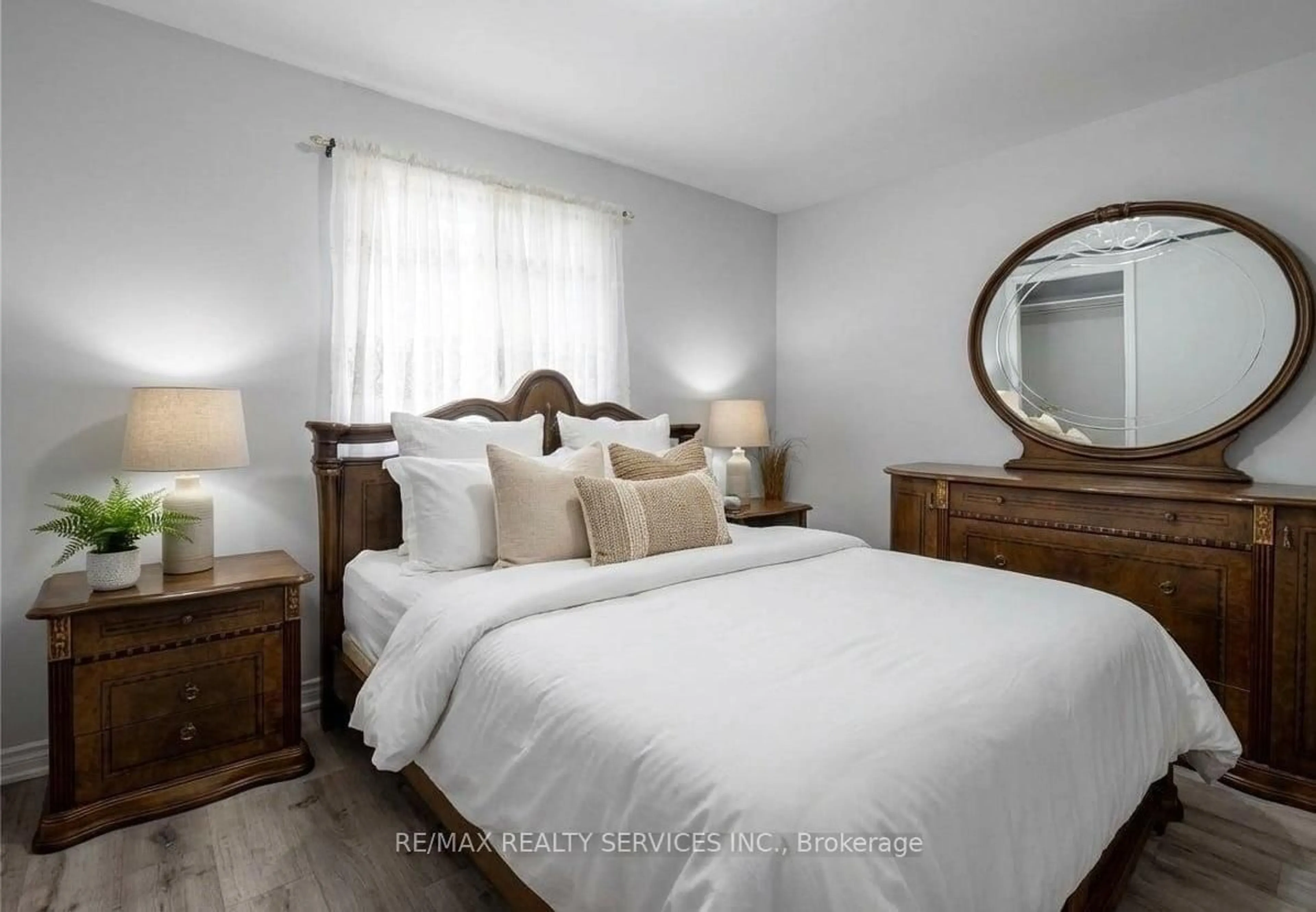 Bedroom with bed, wood/laminate floor for 43 Harding Ave, Toronto Ontario M6M 3A3