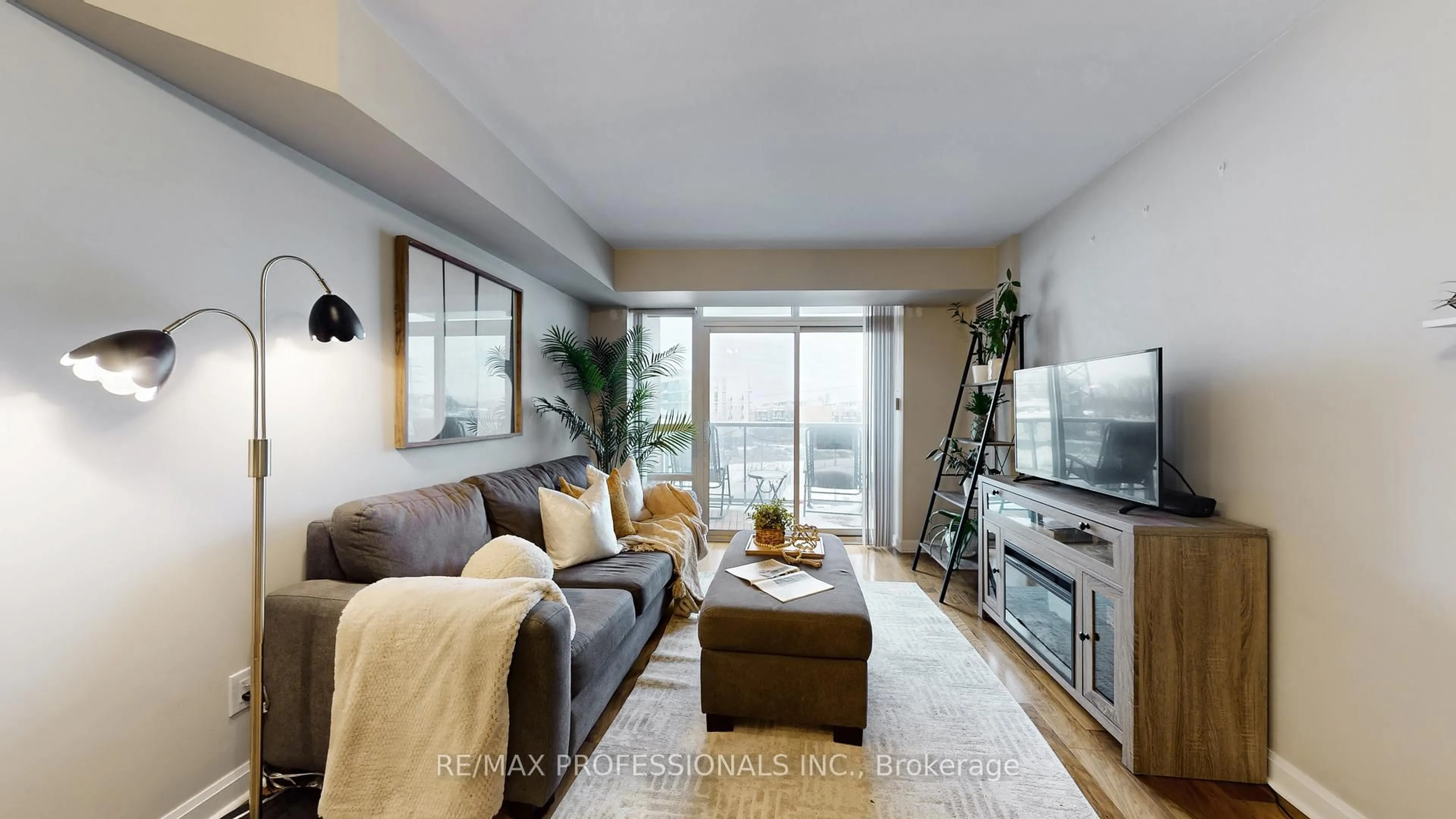 Living room with furniture, unknown for 1 Michael Power Pl #305, Toronto Ontario M9A 0A1