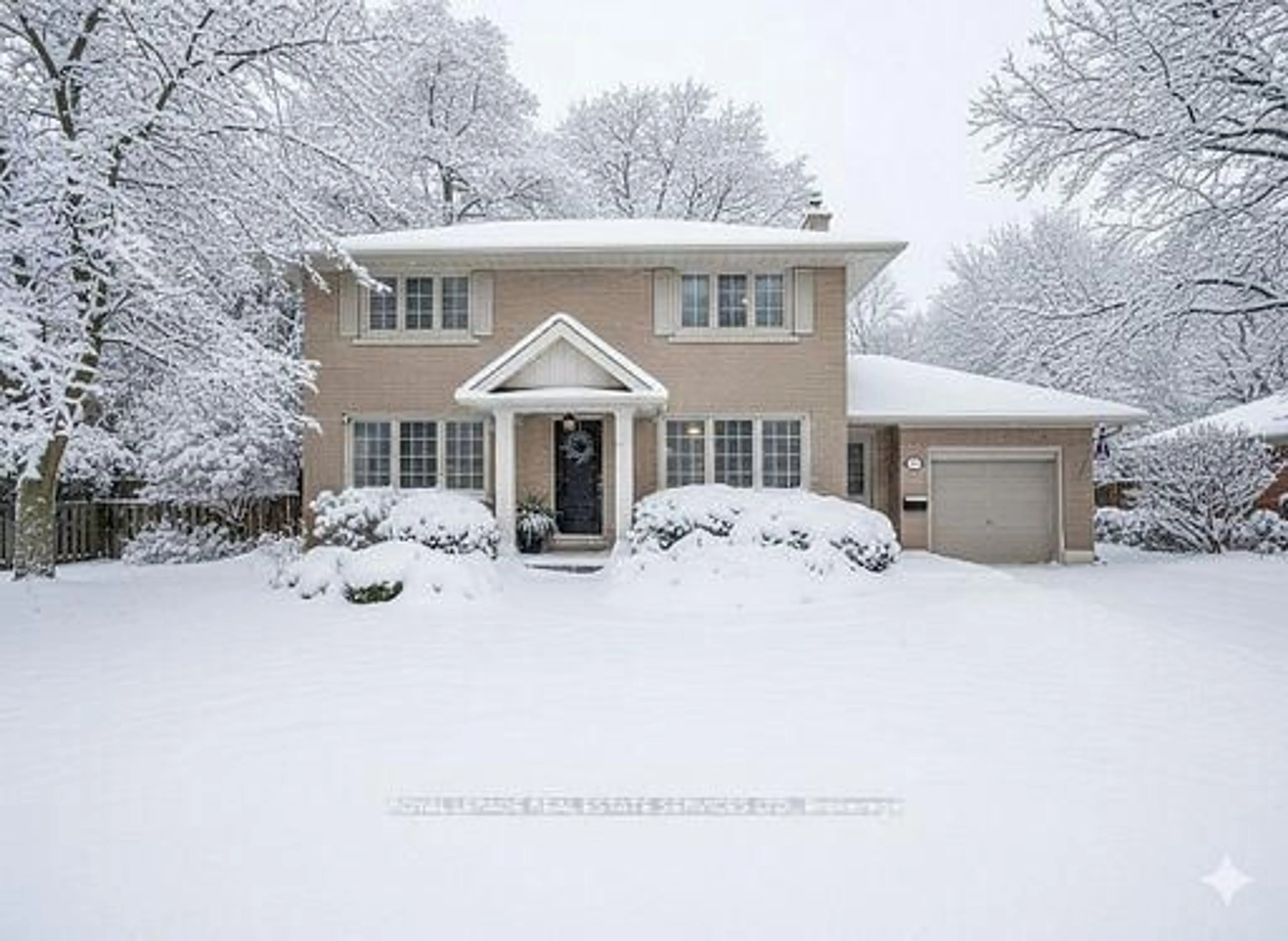 Home with vinyl exterior material, street for 153 Elliott St, Brampton Ontario L6Y 1W7