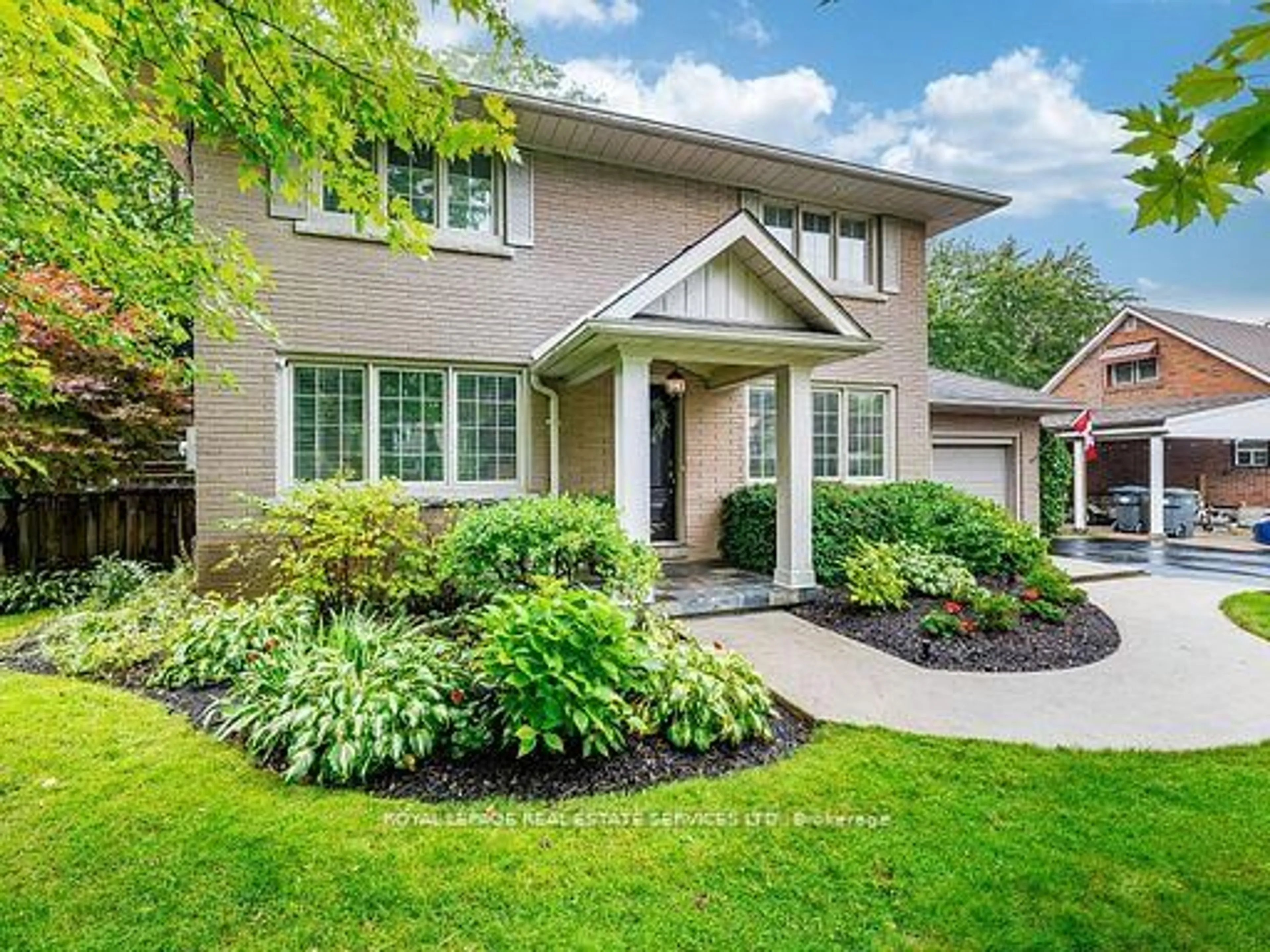 Home with brick exterior material, street for 153 Elliott St, Brampton Ontario L6Y 1W7