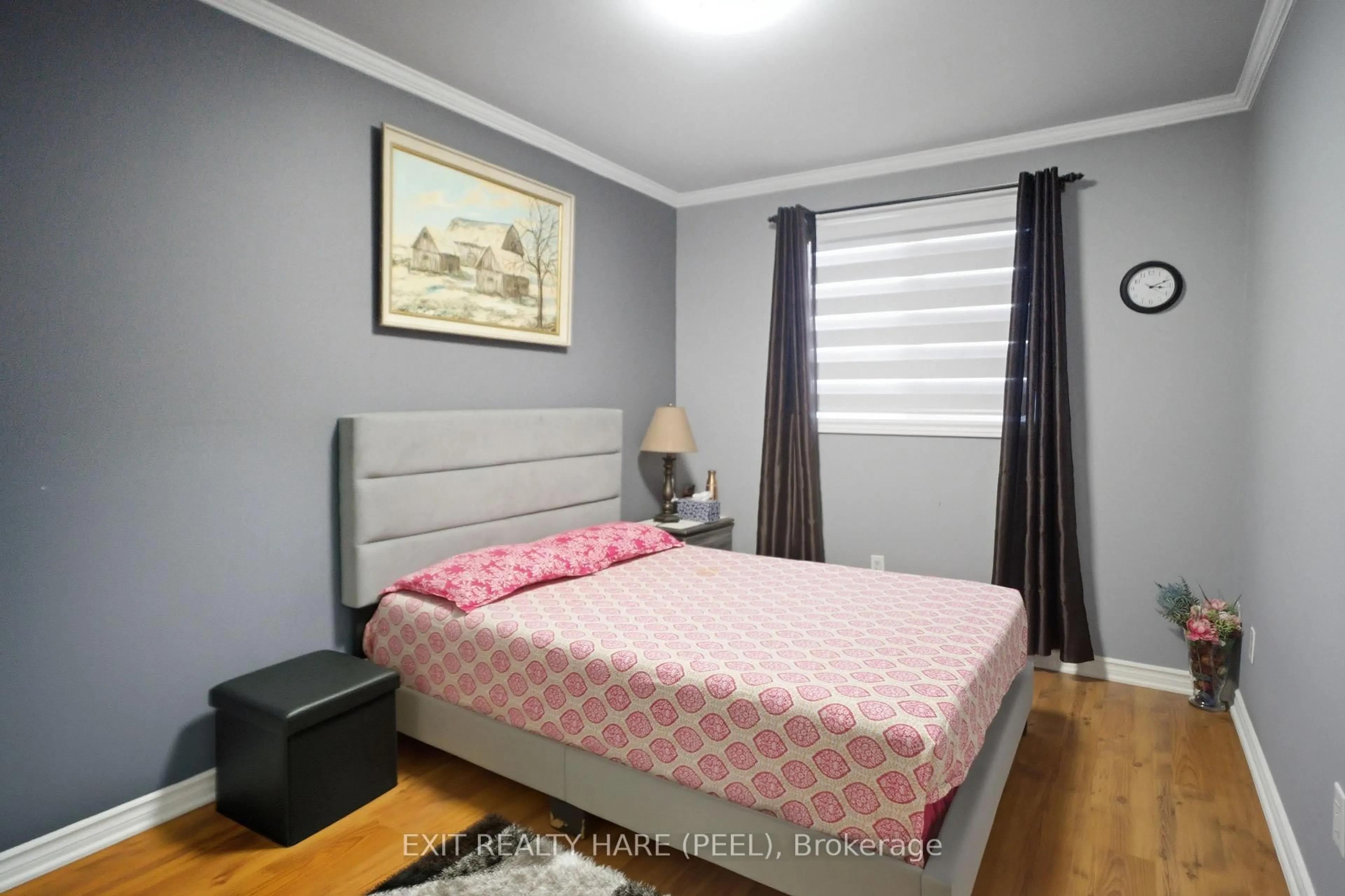 Bedroom with bed, wood/laminate floor for 128 Baronwood Crt #128, Brampton Ontario L6V 3H8