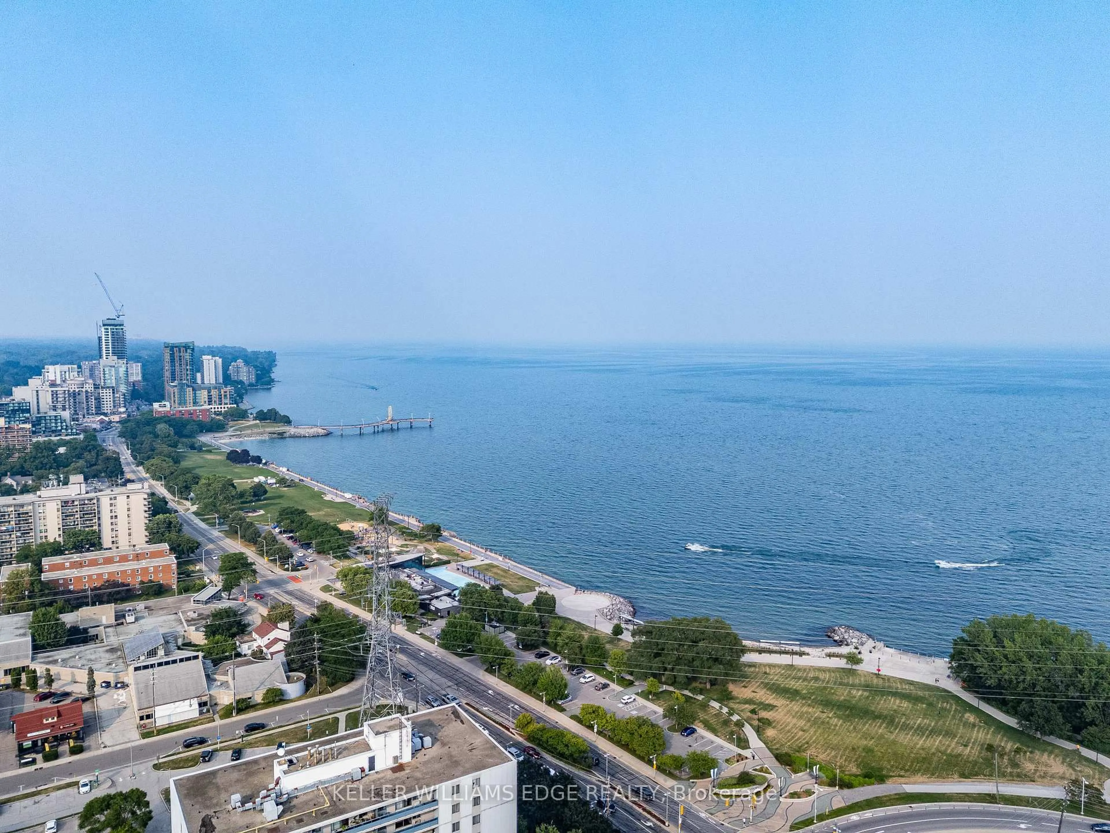A pic from outside/outdoor area/front of a property/back of a property/a pic from drone, water/lake/river/ocean view for 442 Maple Ave #401, Burlington Ontario L7S 2L7