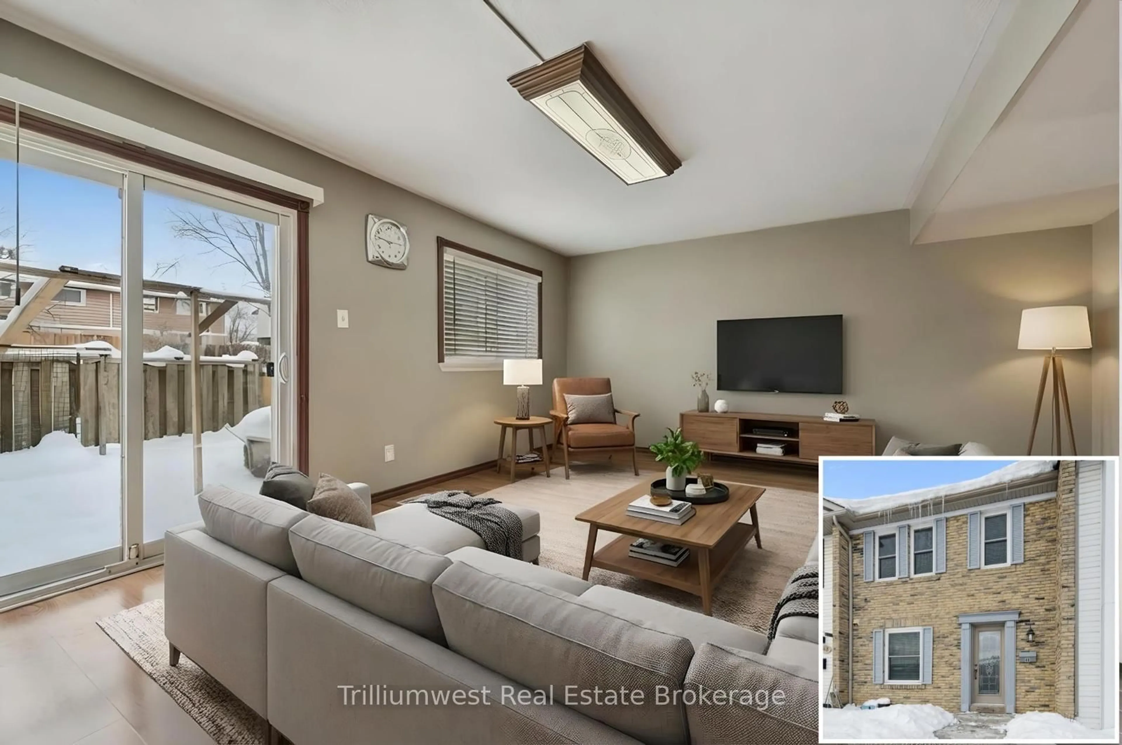 Living room with furniture, wood/laminate floor for 900 Central Park Dr #49, Brampton Ontario L6S 3J6