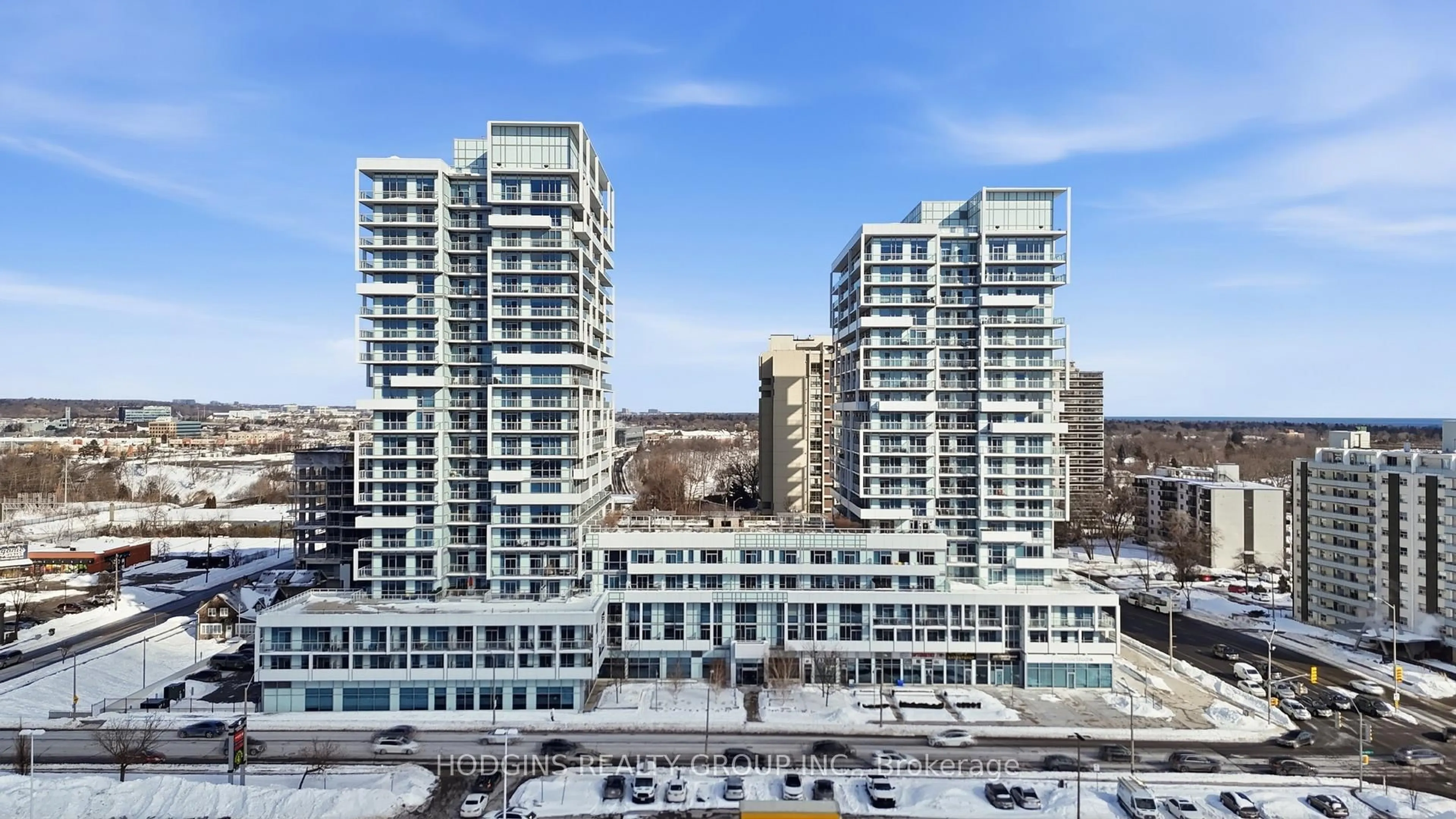 A pic from outside/outdoor area/front of a property/back of a property/a pic from drone, city buildings view from balcony for 65 Speers Rd #214, Oakville Ontario L6K 0J1