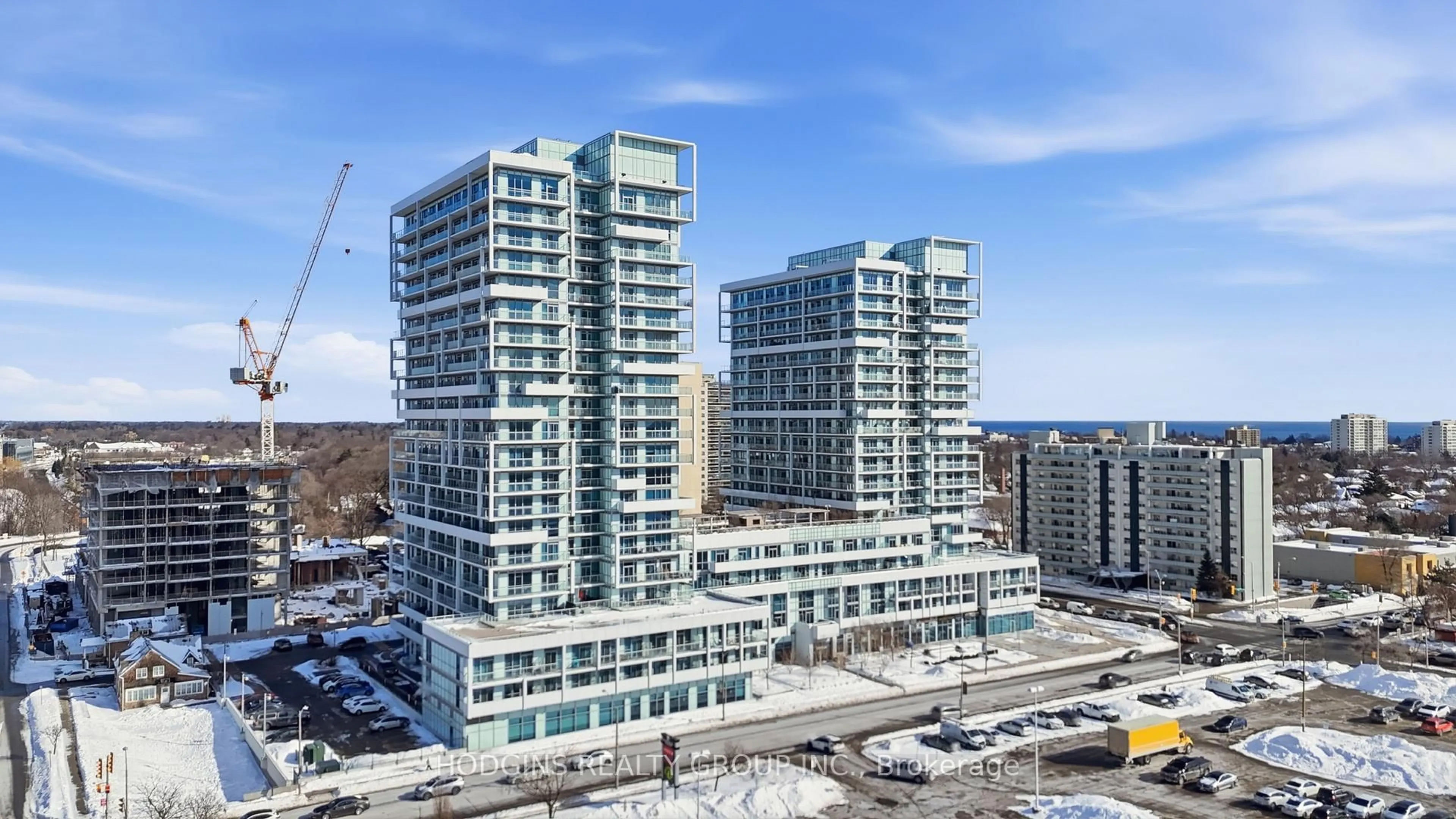 A pic from outside/outdoor area/front of a property/back of a property/a pic from drone, city buildings view from balcony for 65 Speers Rd #214, Oakville Ontario L6K 0J1