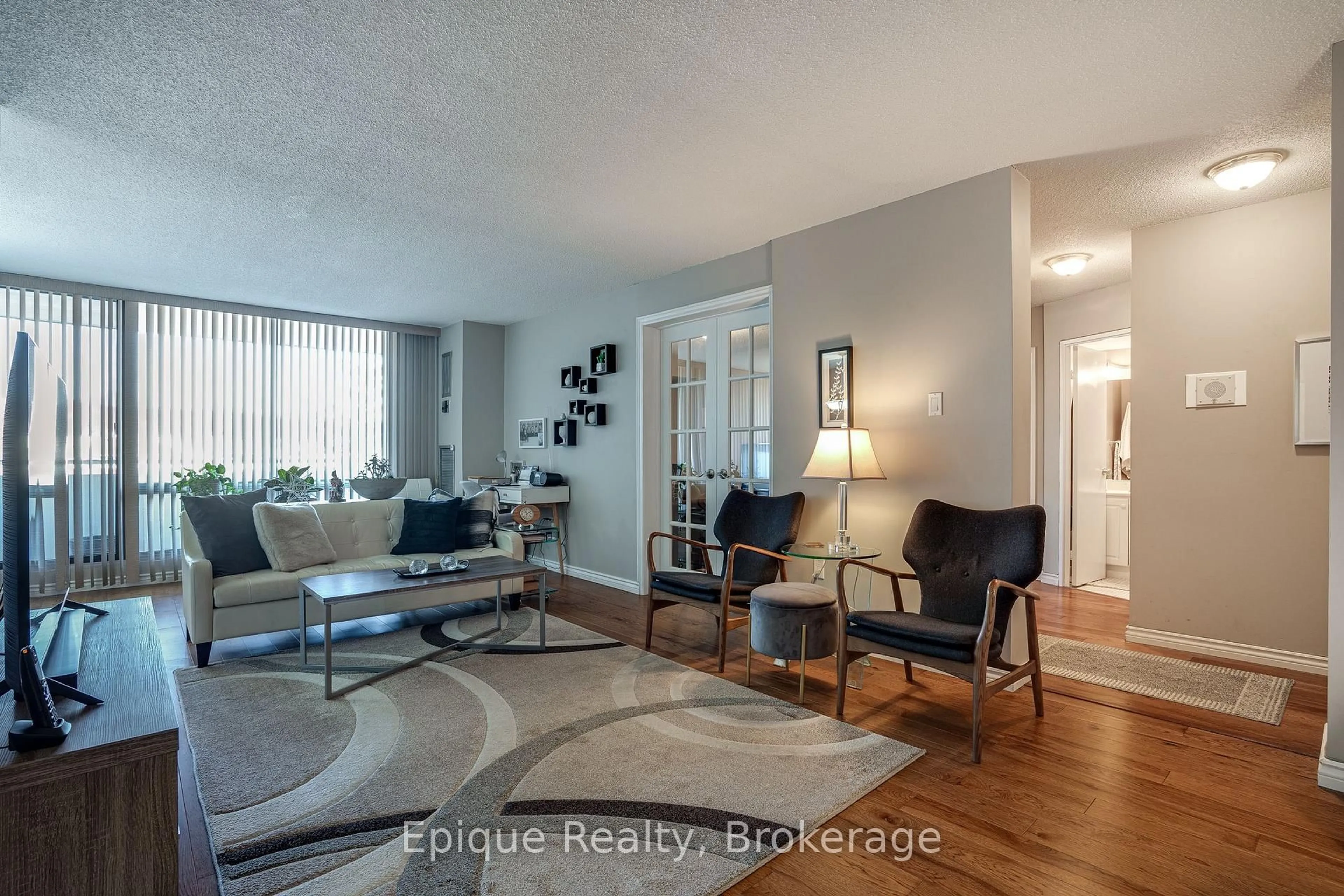 Living room with furniture, unknown for 2055 UPPER MIDDLE Rd #409, Burlington Ontario L7P 3P4