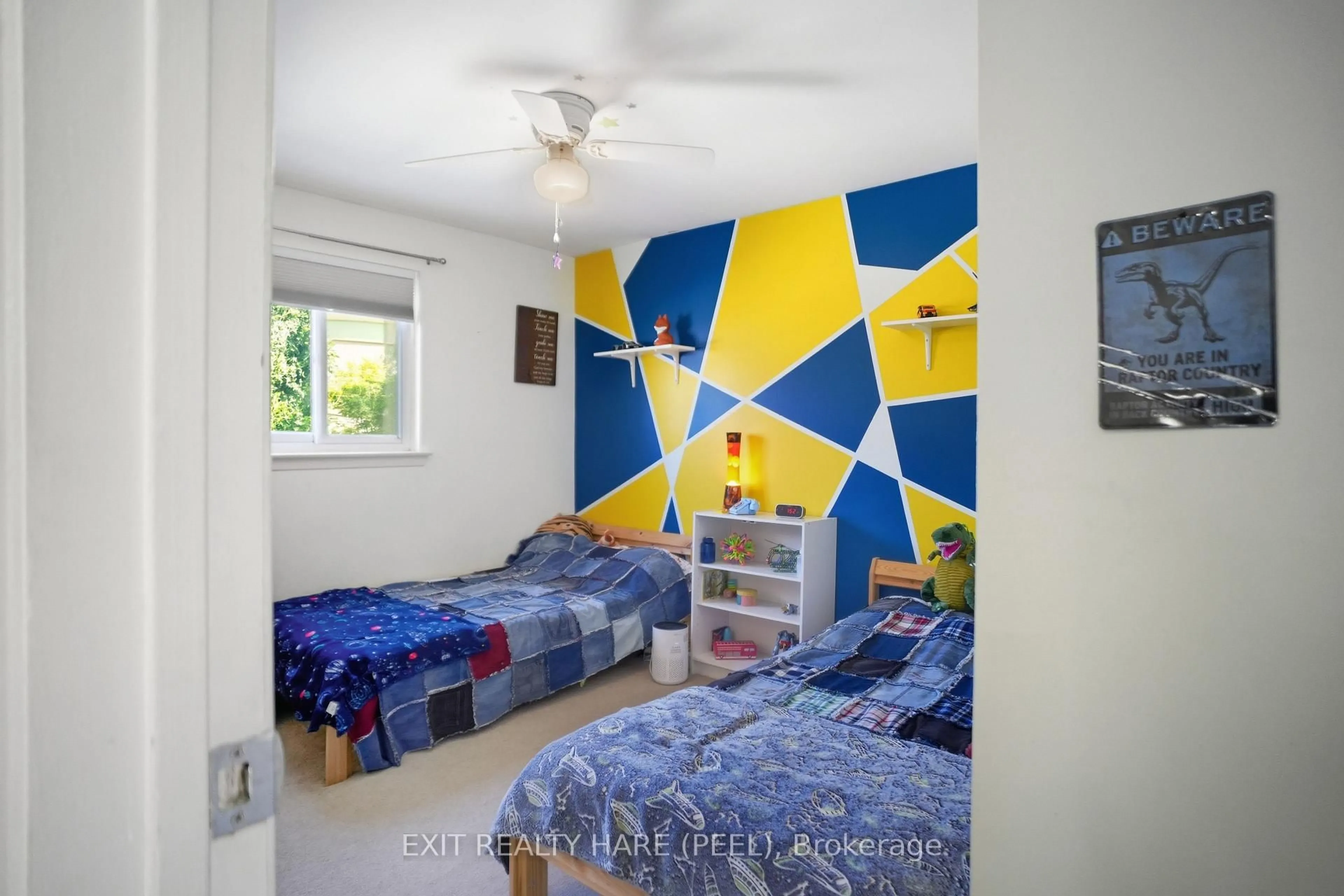 Bedroom with bed, ceramic/tile floor for 20 Sutherland Ave, Brampton Ontario L6V 2H4