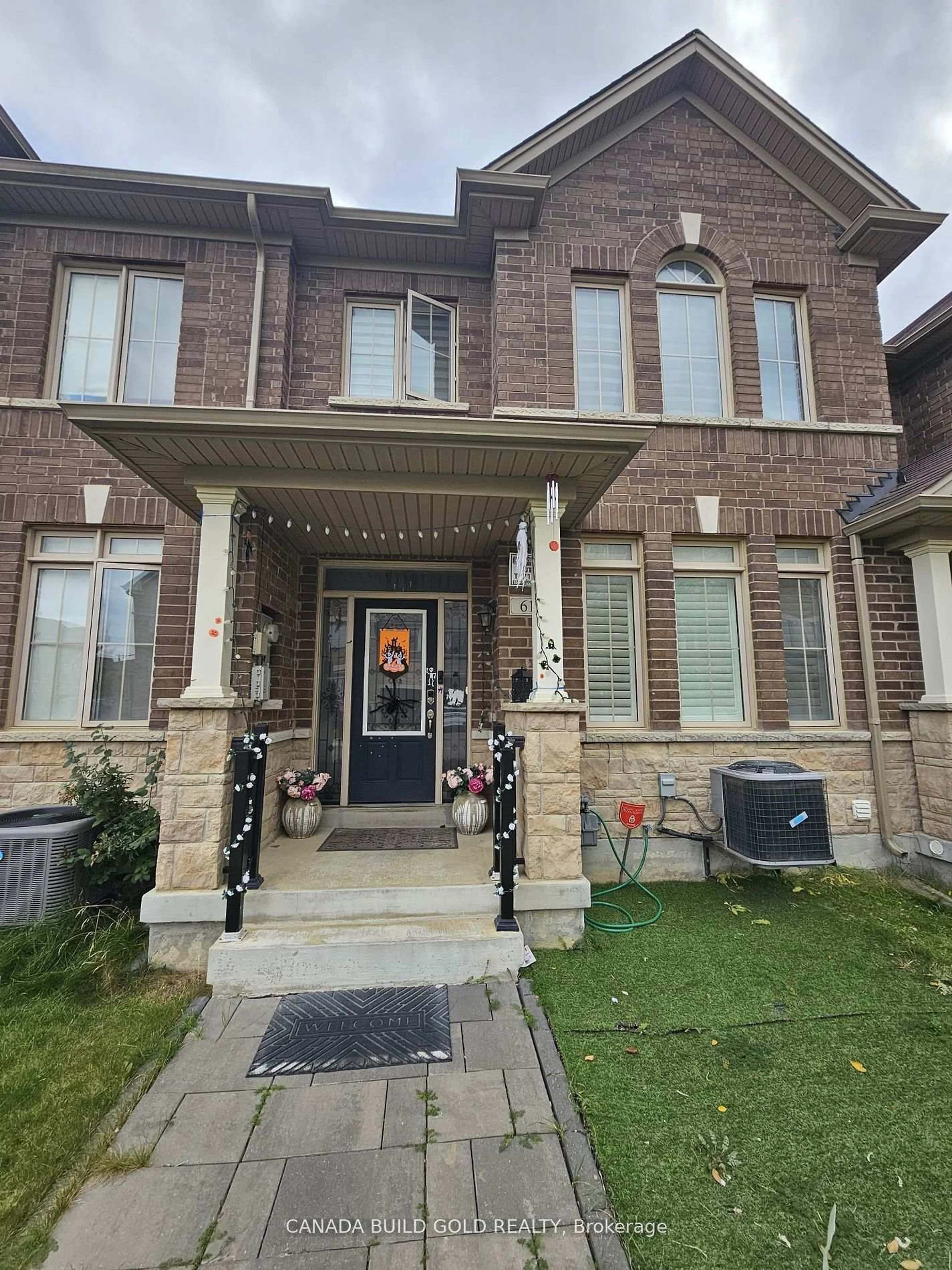 Home with brick exterior material, street for 61 Yellowknife Rd, Brampton Ontario L6R 3X5