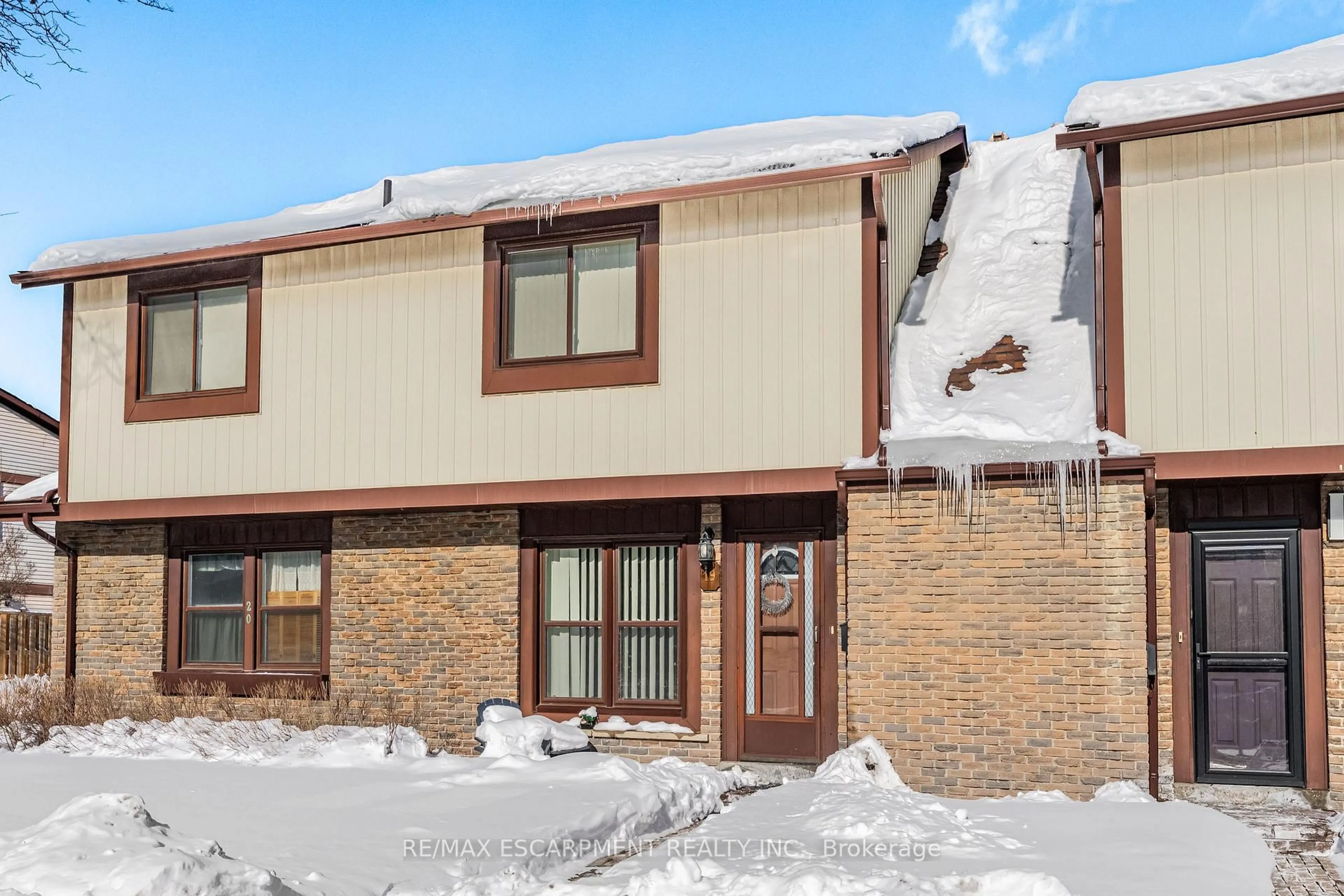 Home with brick exterior material, street for 6650 Falconer Dr #19, Mississauga Ontario L5N 1B5