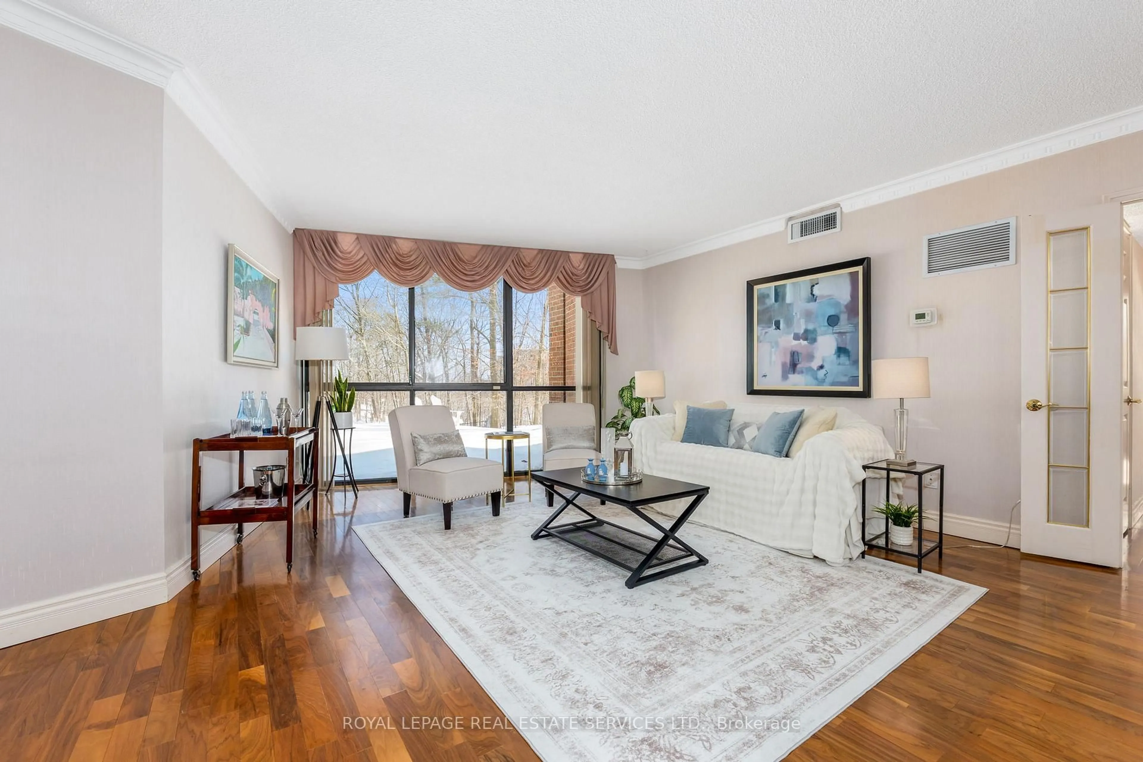 Living room with furniture, unknown for 1240 Marlborough Crt #110, Oakville Ontario L6H 3K7