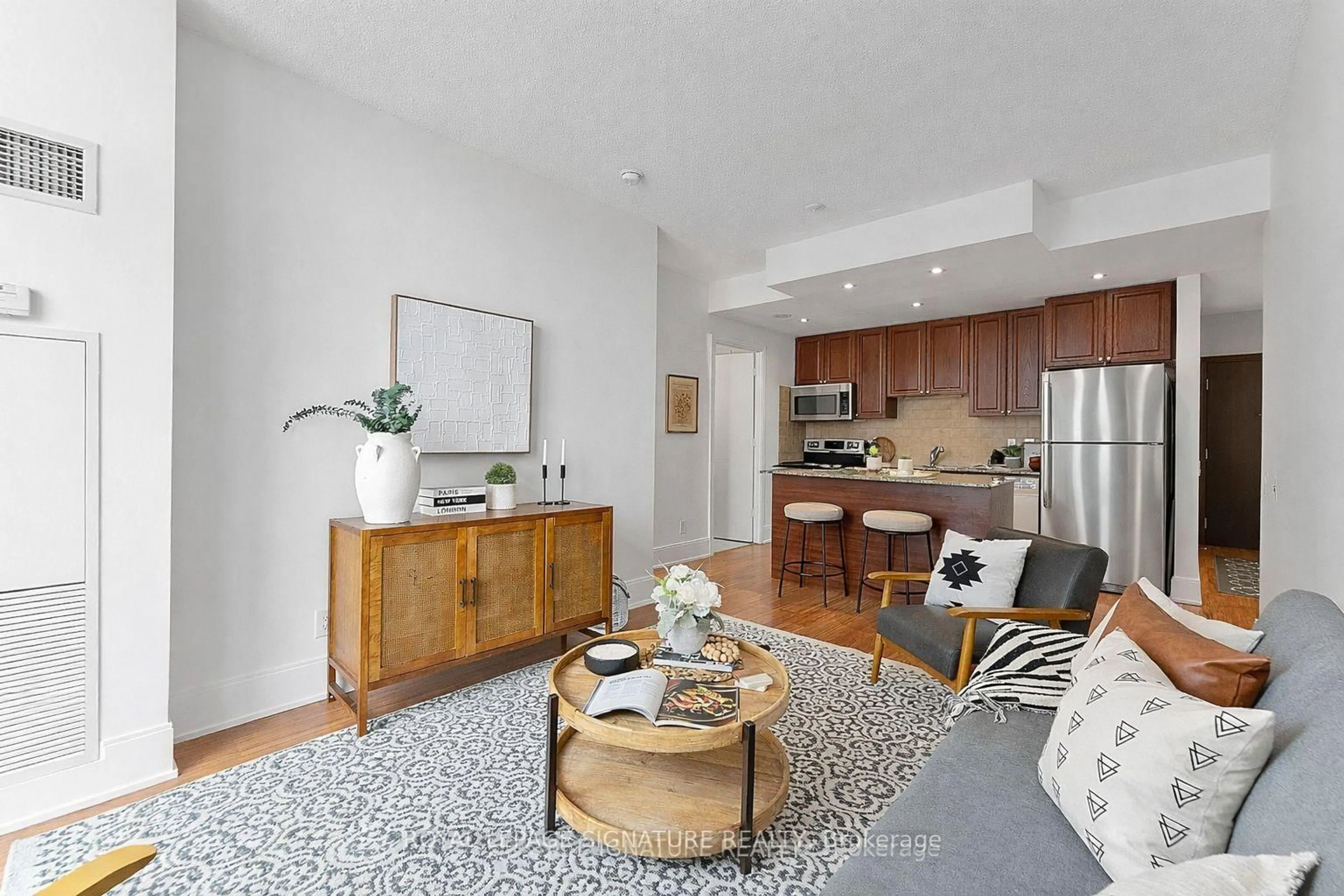 Living room with furniture, unknown for 35 Viking Lane #2645, Toronto Ontario M9B 0A2