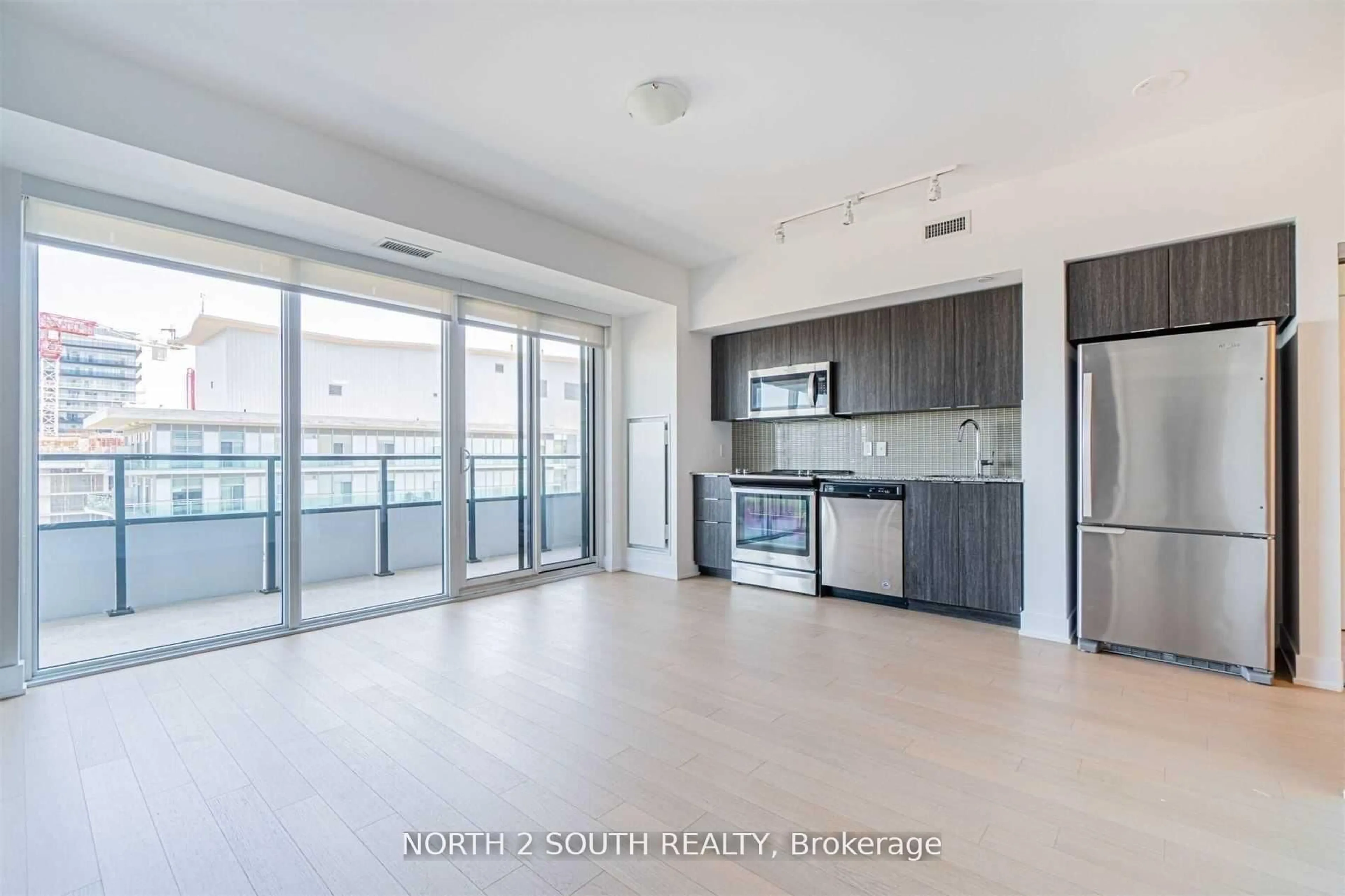 Open concept kitchen, unknown for 30 Shore Breeze Dr #4112, Toronto Ontario M8V 1A1